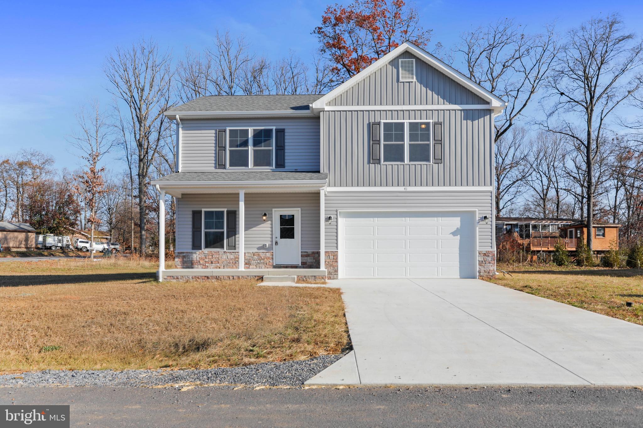 Warfield Homes Inc. has been building custom homes in the Northern Shenandoah Valley for over 30 years. You'll love the openness of the floor plan, the 9' ceilings & the luxury vinyl plank flooring. The kitchen is beautifully finished with soft close cabinets, stainless steel appliances & upgraded countertops. There is a convenient office space on the main level. The spacious owners suite features a stunning tile shower, dual sinks & a walk-in closet. The laundry room is located on the bedroom level. Enjoy morning coffee on the covered front porch. A $2,000 closing cost credit is available with the use of the builder's preferred lender. The completion time frame is approximately 120 days from the issuance of the county building permit.