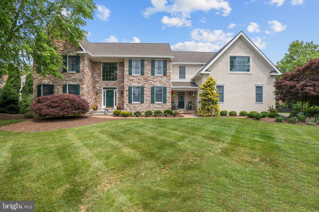 Willow Wisp Farms, located in beautiful Yardley, Pennsylvania offers you an insight of the beauty and privacy this exclusive community of Executive Homes offers each and every homeowner living here. Situated on a premium cul -de-sac you will find this stately Colonial home. Aesthetically, this home gives you not only privacy, but a lovely tranquil setting which only emphasizes its curb appeal and amazing location. Beginning with the professional landscaped grounds, featuring a front private covered patio for you to enjoy your morning cup of coffee, the custom stone walkway leads you to the oversized landing of your front door. Upon entering this center hall colonial which boasts over 4,400 square feet of elegance you will be immediately overwhelmed by the custom woodworking throughout each room, the grand Custom "T" Staircase, hardwood flooring throughout the main and upper levels. The formal living room features a gas burning fireplace, custom sized windows allowing plenty of natural sunlight,. The formal dining room has plenty of room for an oversized table making any holiday more enjoyable to spend with family and friends. The large two piece powder room also features hardwood flooring. The Library-Office features a custom built-in bookcase giving additional storage if needed. The Stunning Great room is the focal point of the main level with its captivating Cathedral ceilings and gorgeous brick faced fireplace. It allows you plenty of room for entertaining larger parties or just relaxing after a long work week to watch your favorite movie. The Eat-in Kitchen has all stainless steel appliances, center island for your convenience of preparing meals, plenty of custom built cabinetry, as well a custom desk area to help keep you organized. The Second level offers Four generously sized bedrooms, with two updated bathrooms. The Primary Bedroom has one walk-in closet as well as an additional storage space The Primary bathroom recently renovated offers an oversized shower with custom glass enclosure, a custom free standing Soaking Tub, two separate dressing vanity areas not to mention all the windows allowing for plenty of natural light coming to greet you every morning. In addition the entire bathroom floor is heated for your comfort on those cold winter mornings. All of these awesome features can be found within this home as well as a fully finished basement giving you a custom built wet bar, screening area, play area, as well as additional storage can be found on the lower area. The oversized 3 car garage gives you the opportunity of keeping two cars inside or turning it into any space you desire. Lastly, location is always the key to purchasing. This home is conveniently located to all major highways, road systems, shopping centers, recreational areas, and community pools, local rail systems, and airports. Do not make the mistake of not coming to see for yourself all the benefits you will have when you decide to buy this beautiful home. Showings to begin 6/22/2023 beginning 10:00 am by appointment only.