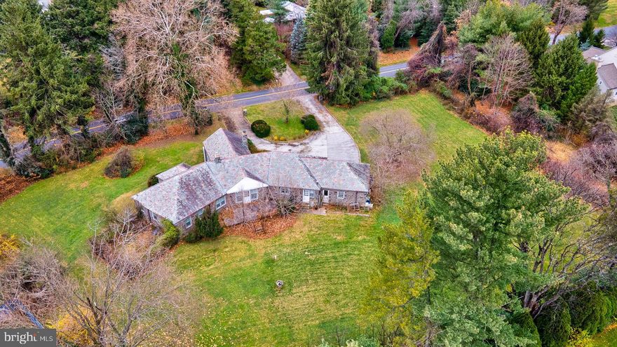 Immeasurable opportunity to restore this lovely stone home to its original stature, or to sub-divide the land into 2 parcels and develop them.  The existing home is fronted by a semi-circular driveway on 1.28 picturesque acres in one of the best locations on the Main Line.  In fact, one of the best and most notable features is the location: a 5-minute walk to Whole Foods, many other shopping locations, as well as the train into Center City and New York.  Don’t miss this rare chance to recreate or build the home you’ve envisioned.
