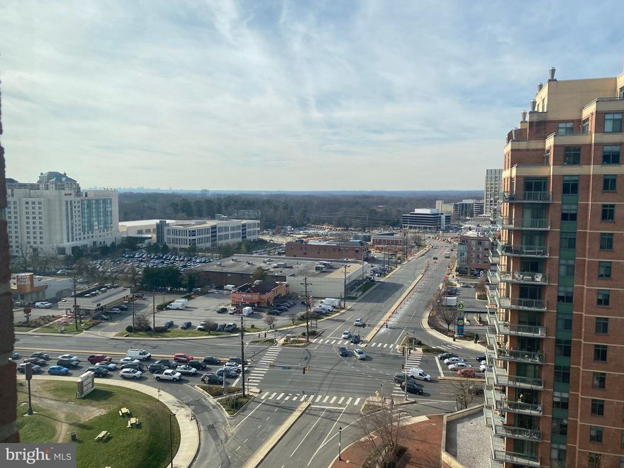 Beautiful open concept floor plan, amazing view corner unit on the 14th Floor at The Gallery West at White Flint ! One of the largest 2 bedrooms, 2 full bathrooms models looking onto North Bethesda's Pike and Rose. Harwood floors throughout. Neutral paint. Master bedroom with large windows, huge tub and upgraded tile flooring, walk-in closet with lots of space. The kitchen offers a breakfast bar and granite counter space, stainless steel appliances and tiled flooring. The Gallery at White Flint is a luxury high rise condominium  24 hour front desk, outdoor swimming pool, billiards room, lounge, well equipped fitness and business center.  Walk to White Flint Metro, grocery stores, and the shops and restaurants at Pike and Rose.
