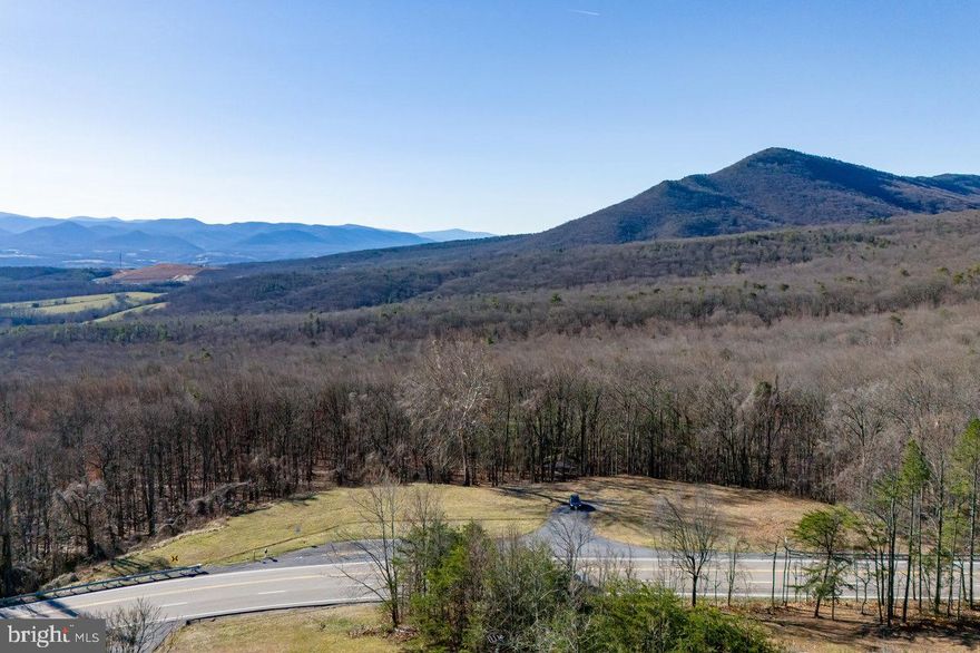 9 stunning wooded acres of land with private boundary with George Washington National Forest boundary! Some of the best panoramic mountain views in all directions that Page County offers! Walking and riding trails already cut throughout! Entrance already in place and 4 bedroom Perk site! This land is ready for you dream Cabin getaway and enjoy the abundant Wildlife! Great Hunting and no HOA to restrict you! River access under 10 minutes away! Walking Distance To Dans Steakhouse! Famed Story Book Trail access close by! Bring your plans for you Cabin! So much to do in the scenic Shenandoah Valley; what are you waiting for?