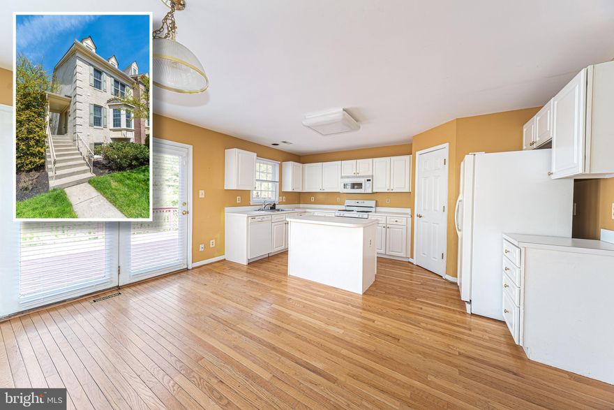 PICTURESQUE END OF GROUP TOWNHOME IN DESIRABLE HUNTERS RUN COMMUNITY WITH OVER 2,600 SQ. FT. OF LIVING SPACE!  Features include an open floor plan with gleaming hardwood floors, crown molding, and chair rail throughout the main level, spacious island kitchen with pantry, tons of cabinet space, & a breakfast area, main level half bath, expansive Primary bedroom suite with a large loft, vaulted ceilings, walk-in closet with built-ins, & a spa bath with whirlpool tub & separate shower, walkout lower level with a family room with a wood fireplace, 4th bedroom, & 3rd full bath, & a large main level deck & lower level patio.  Location can't be beat - located minutes from Hunt Valley Towne Centre, tons of restaurants, and I-83!  Sold As-Is!