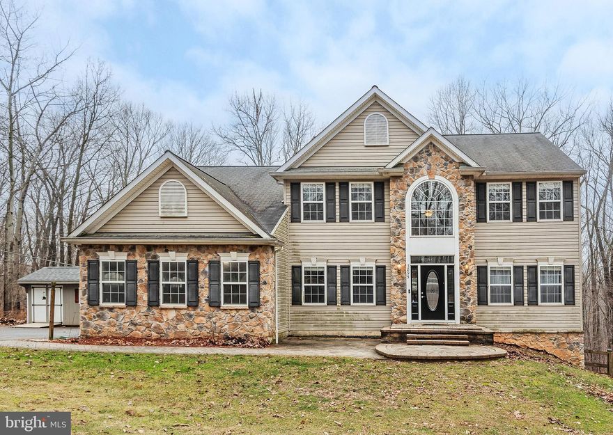 Welcome to this beautifully maintained 4 bedroom, 2.5 bath home with tons of amazing features! Situated on 1.49 acres, you'll note the serene beauty of the location that backs to a Forest Conservation Easement for ultimate privacy. Upon entering, you'll first note the warm wood floors and elegant oak staircase in the two story foyer.  The french doors to your left open to the perfect room for an office or library. To the right, you'll enter the spacious living room that flows into your formal dining room announced by the architectual columns. As you turn to your left, an expansive kitchen fit for the most discerning chef awaits. Featuring tons of wood cabinets, stainless steel appliances, and a lovely island with room for bar stool seating, this will become your favorite space for lively conversation with family or friends while you prepare meals. Additionally, there is a separate area with ample room for a table and chairs where you can enjoy more casual meals. Adjacent to the kitchen is a huge family room with soaring ceilings and a pellet stove for cooler evenings as well as the doors that lead to your enormous deck! The main level is rounded out by a laundry room with access to the two car garage, and a cute half bath for guests. Back in the foyer, you'll ascend to the upper level to first find three generous sized secondary bedrooms as well as a full hall bath with a double vanity sink. Moving to the left and further down the hall, the primary bedroom will be a thrilling discovery! This spacious room provides enough space for the largest of furniture as well as a an enviable walk in closet. However, the real excitement is found in the luxurious en suite full bathroom upgraded in 2022. You'll be delighted by the phenominal tub, lovely walk in shower, dual vanity, and the soothing color palette! Going back downstairs, you'll find your way to the lower basement level. This unfinished space provides endless possibilities for extra finished rooms and storage space.  The pool table conveys as a great start for a game room or play area. Moving outside, you'll find everything you need for outdoor fun! The expansive deck spans the back of the house and is a perfect spot for family fun or entertaining. You'll then notice the above ground salt water pool with deck that's just waiting for the summer temperatures to arrive! Other enviable features are a generator and the high efficiency cold climate heat pump systems for maximum utility cost savings! All of this stands ready for the smart buyer who will make this their next home! 
*All informtion deemed reliable but should be independantly verified for accuracy.