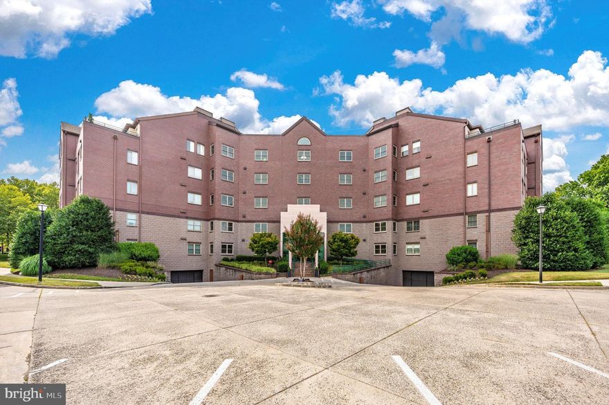 Charming Luxury Condo on the edge of Baker Park.   Discover the perfect blend of comfort, convenience, and style in this beautifully updated in-town condominium.   With 1,562 square feet of thoughtfully designed living space, this 2-bedroom, 2-full bath home offers everything you need for relaxed living or elegant entertaining.   Step inside to find brand new appliances, new LVP flooring, and freshly painted throughout—this is move-in ready and waiting for you.   There is a spacious living room with a cozy fireplace, as well as a large, separate dining area, which has many possible uses - home office, library, etc.   Large Master Bedroom with walk-in closet.   Enjoy your private covered patio, perfect for dining.  Located on a quiet cul-de-sac in a secure building with private/secure garage parking, on-site gym this condo offers the comfort of a well-managed community with the conveniences of city living.   Tucked at the edge of beautiful Baker Park, you’re just steps away from walking paths along Carroll Creek, Sunday Concerts in the Park, and all the vibrant shops, dining, and entertainment Downtown has to offer.  Bike or stroll to the heart of the Arts & Entertainment District or take advantage of easy commuter access to the city and airports.  Generous parking for family & guests.  PRICE REDUCED!!!