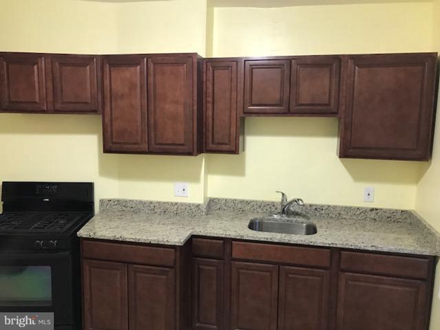 Gracious, Roomy and Comfortable. Newly Renovated, 3 story town home. Conveniently located in the nice and quite neighborhood of Beverly Hills. Close Proximity to Supermarket and other amenities. Easily Accessible to Morgan Sate University. This is a 3 bedroom, 1&1/2 bath townhouse. Spacious and appealing to eyes. 3 spacious bedrooms on the second floor, New Laminated Floor on the Main floor