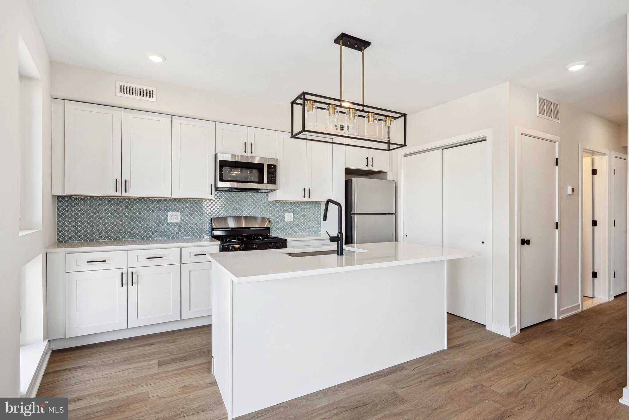 Welcome to 138 Tasker St, a brand-new construction building offering modern living at its finest. This beautifully designed unit features a spacious layout, hardwood floors, and high-end stainless steel appliances—including an in-unit washer/dryer, dishwasher, garbage disposal, microwave, and oven/stove. Enjoy sleek, contemporary bathrooms, and large windows throughout the unit that bring in abundant natural light, creating a warm and inviting atmosphere. Private access to your own roof deck offers stunning views of the city, and plenty of space to enjoy warm summer nights. You are just steps from Dickinson Square Park and the Delaware River Waterfront, as well as tons of vibrant cafes and restaurants. Parking is available for just $150/month, a convenient price with I-95 just a few minutes drive away. Pets are welcome—cats with a one-time $350 non-refundable fee, and dogs with a $500 non-refundable fee (size and breed restrictions apply). Don’t miss the opportunity to live in one of Philly’s most desirable neighborhoods!