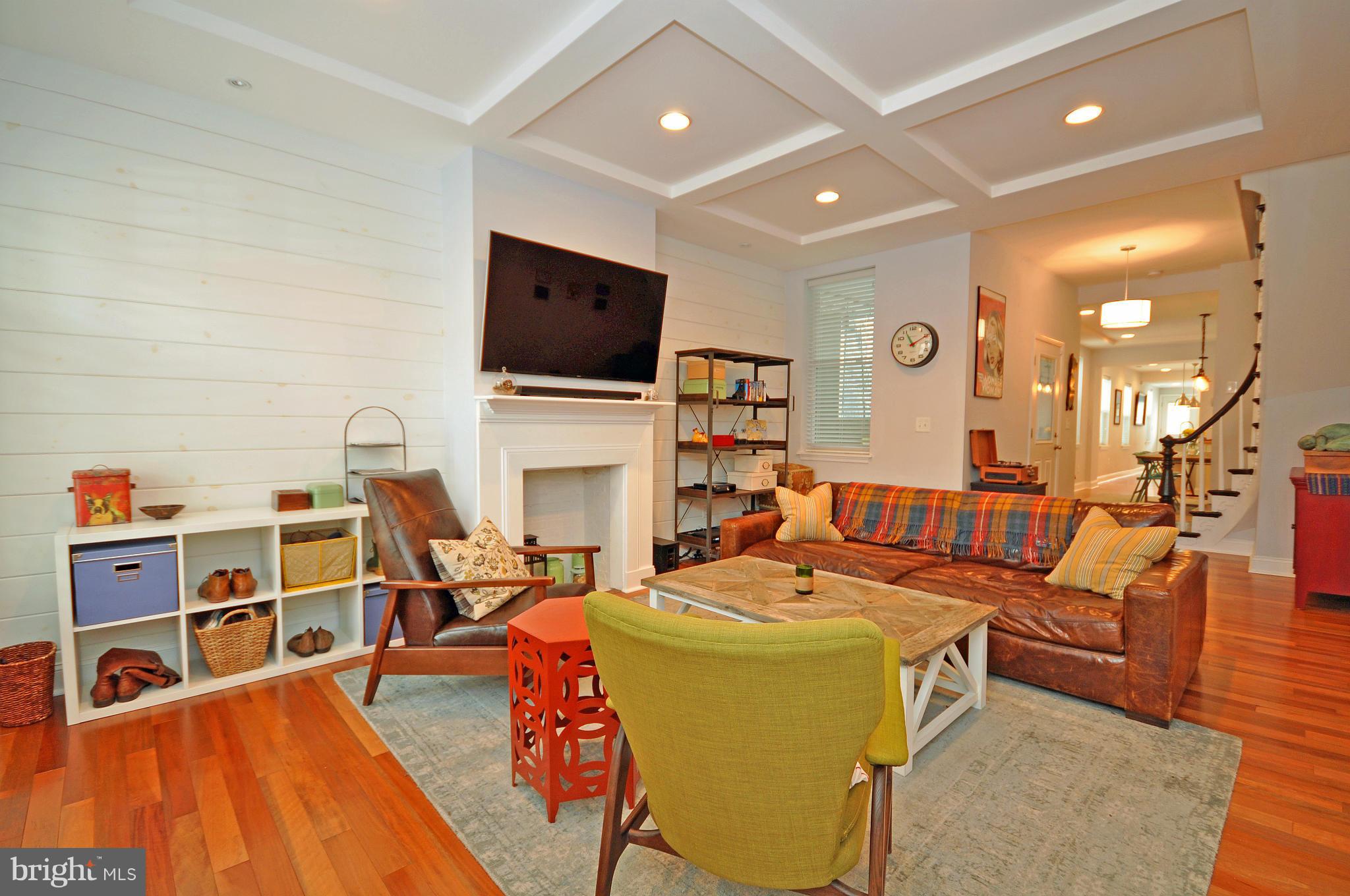 Stunning reno has a classically modern aesthetic, super functional layout, rooftop deck w/spectacular skyline & water views, 2-car parking pad & 8 yrs remaining on historic tax credit. Gorgeous main level w/coffered ceilings, original curved staircase, shiplap walls & exposed ductwork. Kitchen w/marble counters & SS appl. Master suite w/spa BA & CA Closets WIC, plus 2 more BRs w/dedicated FBs.