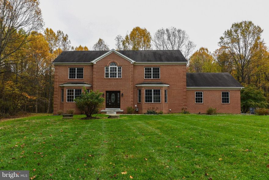 Located down a private road. Ample Driveway space. 5 acres + a huge amount of backyard space - perfect for entertaining guests. Fresh paint + new carpet installed on upper level. Main baths redone. Finished basement w/ a modernized look + bar. Nearby Wegmans, Fair Oaks, Costco, Walmart, Home Depot, + more! In great Ffx County school district. New dishwasher, refrigerator, + cooking range installed