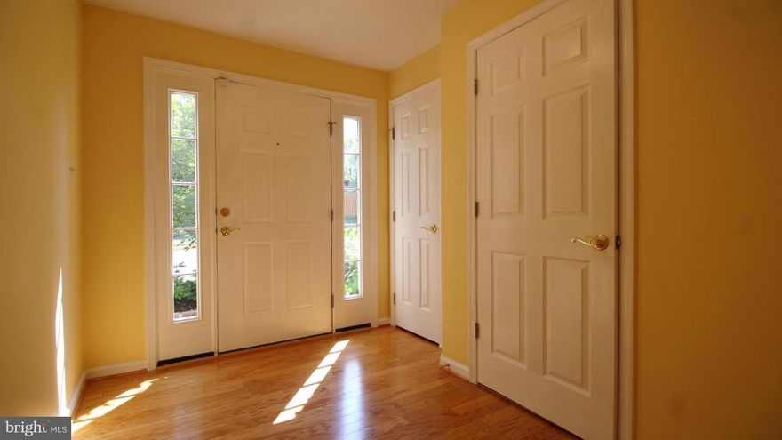 LOVELY light and bright classic colonial townhome in sought after Potomac Lakes!  This townhome is loaded with lovely features and 3 bedrooms/ 2 1/2 bathrooms, gleaming hardwood floors on all levels.  Beautiful living room with gas fireplace.  Gourmet cook's kitchen.   Sunroom off kitchen walks out to deck.  Master bedroom with walk-in closet, luxury bath.  Great commuter location: quick walk to commuter bus, 15 minute drive to Wiehle metro, close to route 7, One Loudoun, Cascades, and so much more!  A MUST SEE!