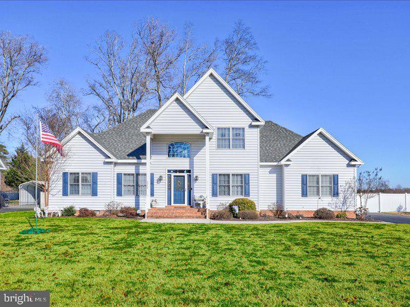 Welcome to your new home! Beautiful curb appeal leads you right inside to a lovely 2 story foyer. First floor features the living room/office to your left, dining room to your right , an eat-in kitchen w/ stainless appliances, gas stove, breakfast bar that is open to a spacious family room with vaulted ceiling, skylights, gas fireplace. Beyond the family room you will find the first floor master bedroom with an en suite. The sliding door allows access to a relaxing screened porch. An open hardwood staircase leads to a spacious loft w/ walk-in closet that overlooks the foyer and family room and can serve to your needs and desires! The 2nd floor also offers 3 bedrooms and a full bathroom along with pull down stairs that has ample storage above. Other features of the home include a deck, big back yard with vinyl privacy fence, 2-car garage, asphalt driveway. One year Home Warranty included