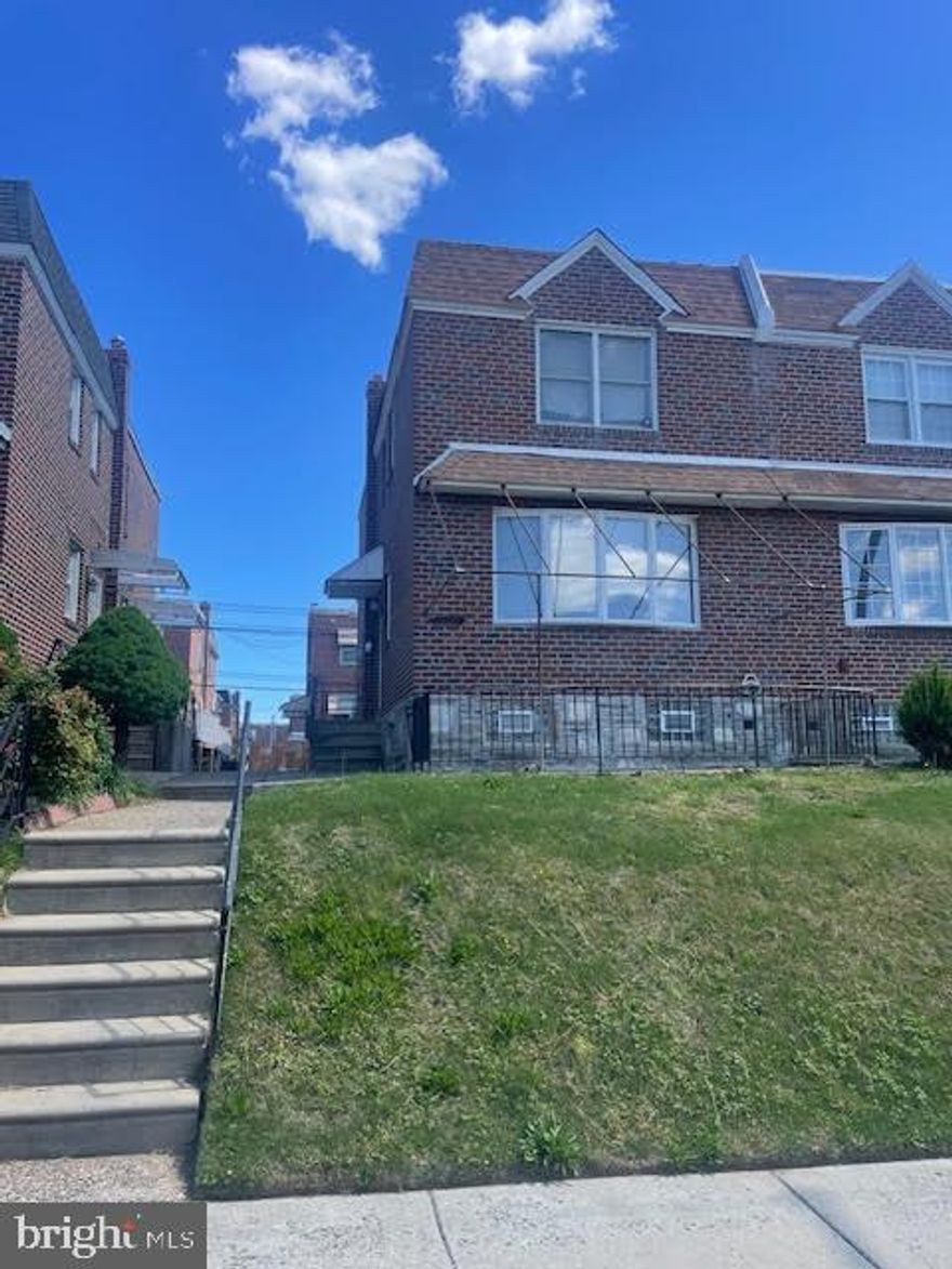 Bells corner brick twin with front patio and rear driveway parking and one car driveway parking. Property being sold in as is condition. 
First floor has living room, dining room with half bathroom at top of stairs to basement and kitchen at rear - straight through style.
Second floor 3 bedrooms and hall bathroom.
Basement finished with newer heater and central air.