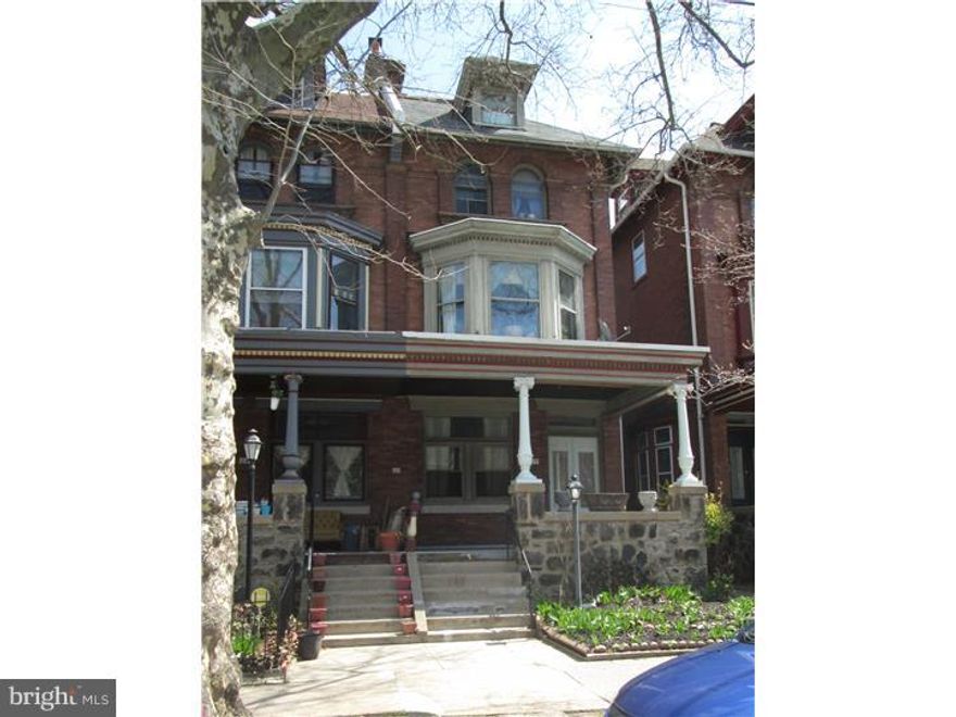 In the University City neighborhood, this beautiful Victorian twin is large and bright. 6 bedroom, 2-1/2 baths, the home has original wood floors throughout. There is a fireplace in the living room, large formal dining room and very large, eat-in kitchen with beautiful cabinetry and generous counter space. 3 bedrooms and bath on the second floor, 3 bedrooms on the third floor with dormer windows. The main bedroom has a wonderful bay window and an ornamental fireplace. A second staircase connects the kitchen to the second floor. There is a lovely front flower garden and a large back yard. This home is in the Lea Catchment, perfect for a family with K - 8th graders.