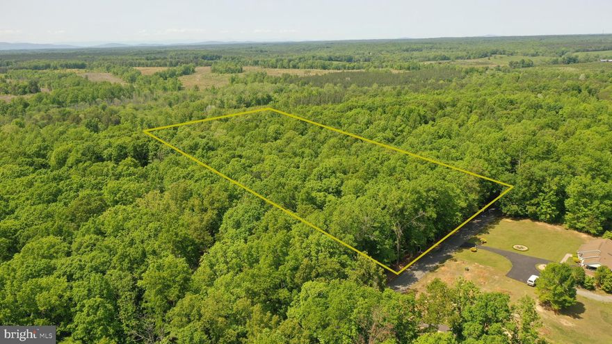 Welcome to your new haven of seclusion and privacy! Nestled on a peaceful state-maintained road, this property offers an excellent opportunity to establish your next home in a serene and picturesque setting. As you explore the gently rolling topography of this land, you'll notice that it is mostly made up of large mast producing hardwoods, making it an ideal location for outdoor enthusiasts and nature lovers alike. Imagine yourself waking up to the soothing sounds of rustling leaves, chirping birds, and the sweet fragrance of fresh air. The property has road frontage along Roundabout Rd, providing easy access to power that is located nearby. You'll be just minutes away from I-64, giving you the perfect balance of rural living and urban convenience. With no HOA or covenants, you'll have the freedom to build your dream home exactly the way you want it, without any restrictions. Whether you're looking to build a permanent residence, a vacation home, or a rental property, this is a great investment opportunity that you don't want to miss. The natural beauty of the surrounding area makes this property the perfect place to call home. Don't wait any longer to make your dreams a reality. Contact us today to schedule a showing and see for yourself why this property is the perfect investment opportunity for you.