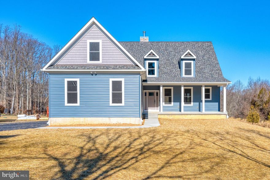 Custom Home by Griffiths Builders on 1.5 acre cleared homesite.  4 BEdrooms 3 Baths. 
Open Concept Floorplan with main level family-great room w/fireplace off kitchen and dining room. 
Main floor flex room (office/bedroom).  Owners Suite  with WIC and Private Bath w/walk-in shower. 2 Additional Bedroom and Bath.   2nd Floor Bonus Room (over garage). 3 Car Garage.  Full Basement (unfinished).