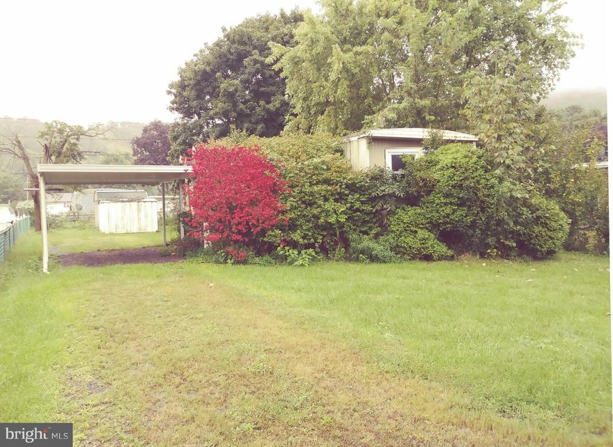 2 Bedroom Mobile home on its own lot. Features level fenced yard. Priced to sell.