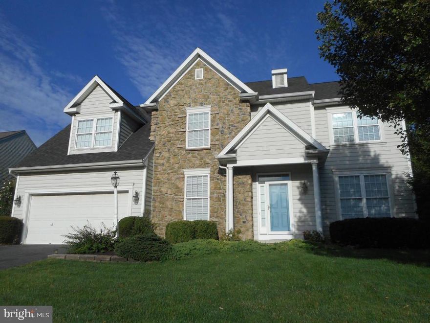 Beautiful 4BR home in Manheim Twp's Penns Crossing/Reidenbaugh Elemtry Schl.  Main level open flr plan boasts hardwood throughout.  Loaded w/ extras, gas FP in family room, eat-in kitchen w/ island and desk, crown molding, chair rails, large deck, backyard w/ mature trees.  Master BR has walk-in closet, master BA w/ garden tub.  Unfnshd basement w/ roughed-in plumbing ready for your touch. Walk to Manheim Twp Park and Shoppes at Bloomfield Square