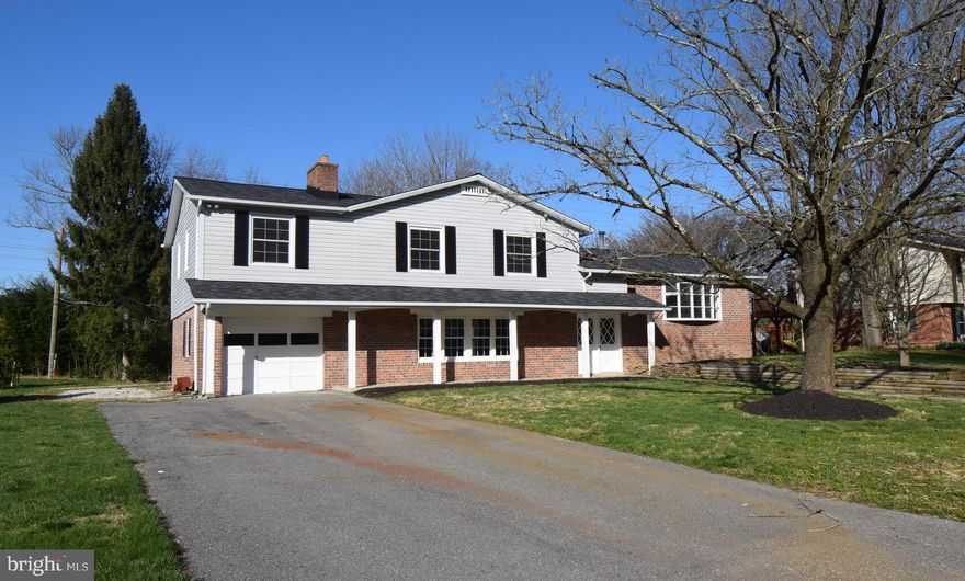 This beautiful, fully updated home has everything your family needs and more! This one of a kind floor plan features two massive living spaces, a whopping SIX bedrooms and THREE stunning full bathrooms! The upper space is home to a spacious remodeled kitchen with granite counters and new stainless steel appliances. The kitchen opens to the equally spacious living room with beautiful bay windows that let in so much natural light and a dining room. The lower living space, complete with a cozy fireplace, would be perfect for a recreation room or playroom. The top level has five of the bedrooms, which includes a master with an en suite bath that will take your breath away. Any extra bedrooms can be used as a guest room, office, or craft room - the possibilities are endless! And just in time for summer, you can enjoy the breeze without the bugs on the massive screened-in porch or take a dip in the hot tub. Don't miss out on this special home in the desirable Ellicott City community!