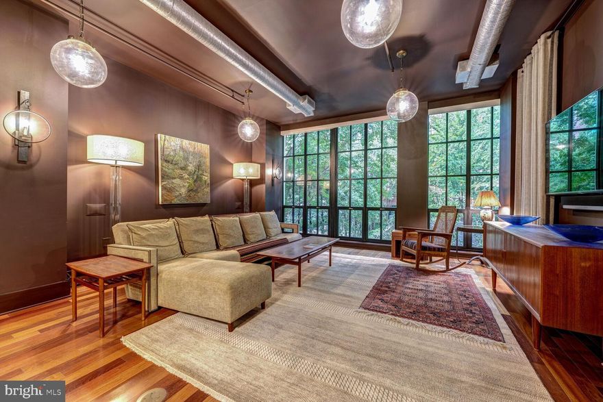 Live in style at The Mercer Lofts in Rosslyn! This luxury 1-bedroom plus large den apartment lives like a 2-bedroom and comes with two garage parking spaces. Enjoy a bright, open layout with exposed brick accents, floor-to-ceiling windows, and high-end finishes throughout.

The modern kitchen is a chef’s dream with a Wolf gas range, stainless steel appliances, and plenty of storage. The spacious bedroom offers a custom walk-in closet and a sleek ensuite bath with double vanities and a spa-inspired shower. The den with a full bath is perfect for guests or a home office.

Relax and entertain with access to premium amenities including a swimming pool, fitness center, club room, and concierge. Rent includes water, gas, heat, trash, and high-speed internet.

All this in an unbeatable Rosslyn location—steps to Metro, Georgetown, Clarendon, Gateway Park, and just minutes to downtown D.C., Reagan National Airport, and Amazon HQ2.

Luxury, location, and convenience—everything you’re looking for in one incredible home.