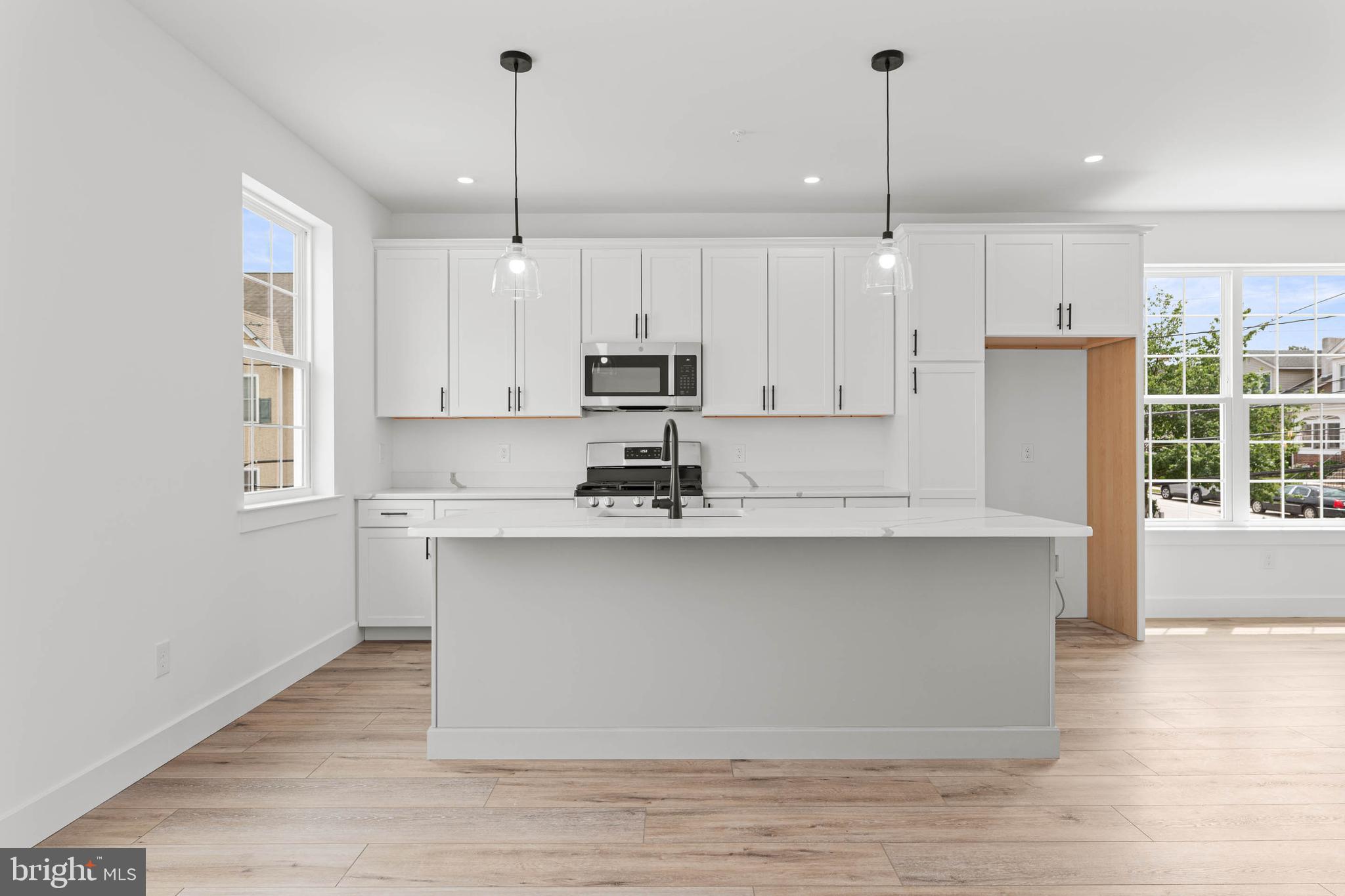 Discover the perfect blend of modern style and practical design in these brand-new construction townhomes at Bridgeview Crossing. Featuring 7 exclusive residences, choose from spacious 3- and 4-bedroom models with 2.5 bathrooms and over three levels of thoughtfully designed living space.
Step inside the home from the covered front porch to the entryway with coat closet. The main level features an open concept layout with 9-foot ceilings, luxury vinyl flooring, and plenty of natural light. Throughout the home, recessed lighting enhances the bright, modern feel. A convenient powder room and pantry add functionality to this stylish space. The gourmet kitchen serves as the heart of the home, showcasing a stunning 8 foot island, 42 inch cabinets, quartz countertops, and a suite of GE stainless steel appliances. Seamless flow from the kitchen to your private Trex deck makes entertaining easy.
Upstairs, retreat to your primary suite, complete with a walk-in closet and a spa inspired bathroom featuring dual vanities, tile flooring, and a walk-in shower with a semi-frameless glass shower door. The second bedroom is spacious with ample closet space, while the hall bathroom, linen closet, and convenient laundry area add to everyday ease. All bedrooms are wired for ceiling fans to provide added comfort and flexibility.
The top floor offers a third bedroom, perfect as a guest space, home office, or private retreat, complete with a deep storage closet for versatility.
The finished lower level expands your living space and opens to a second Trex deck, ideal for outdoor gatherings. Inside, enjoy direct access to your 1-car garage, wired and ready for your EV charger, with additional storage space. A private driveway provides added convenience.
Located in the highly regarded Upper Merion School District, and just minutes from King of Prussia, Conshohocken, major commuter routes, shopping, dining, and recreation, Bridgeview Crossing delivers ample space, modern luxury, and a truly convenient lifestyle – all with no HOA fees.
Schedule your private tour today!