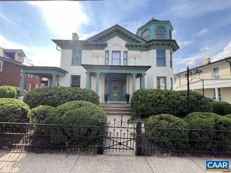 Welcome home to 409 Park Street. Located just two blocks from the Downtown Mall, stroll to Fridays After Five concerts at the Ting Pavilion, shop at local stores, enjoy the culinary delights of Cville's exceptional restaurants, or peruse the weekly farmer's market to create your own in the large open chef's kitchen of this thoughtfully restored gem. Keeping all the charm of this Queen Anne style estate, major renovations were made within the last couple years to restore this building to the grand home it was intended to be. The home features 12 foot ceilings downstairs and 10 foot ceilings upstairs and the renovations include new flooring and fresh paint throughout, an all new kitchen, updated bathrooms, restored windows with new storm windows, a newly installed fence with in the front and back with an automated gate and much more. The exterior provides ample gated parking in the back, a green area with the potential to be made into a beautiful garden, and a blank canvas behind the back porch to create a backyard retreat. While 409 Park St has been restored to a home, possible uses are only limited by your imagination. Current zoning allows for multiple uses including as an office, retail, restaurant/cafe, and as a hotel/inn.,Granite Counter,White Cabinets