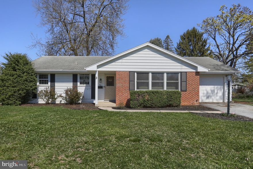 Enjoy one floor living in this sweet ranch home in a great neighborhood.  This super convenient location is  just a short walk to schools, pool and playground.  New gas furnace installed in 2023 plus new windows in living room and two bedrooms.   Lovely hardwood flooring in living room, hall and all bedrooms.  Kitchen features ceramic tile flooring, pantry and a new fridge and is open to a spacious dining area.  From there, sliding doors lead out to a delightful screened porch - perfect place to enjoy your morning coffee, meals or evening beverages in mild weather.   Laundry hookups conveniently tucked into a nook in the garage.  The basement offers potential for additional living space, if desired.  A beautiful, large back yard completes the picture including a shed which also doubles as a greenhouse.  Add this sweet home to your must see list!