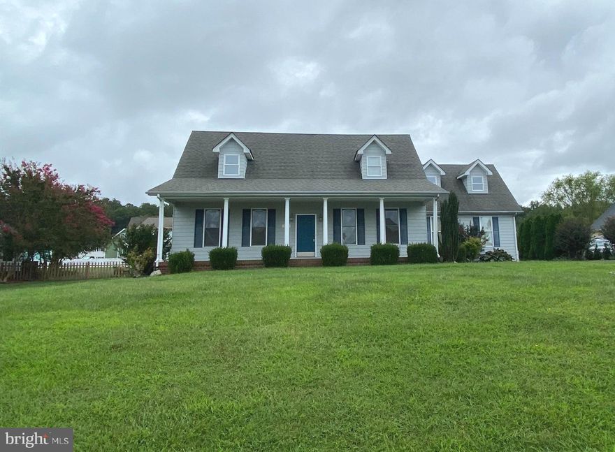 Check out this cute 4 bedroom, 2.5 bath Cape Cod in Potomac Shores.  Relax on the large front porch and take in the amazing water views of the Potomac, located directly across the street! The main level features an open floor plan for entertaining, and a spacious primary suite with a bedroom and full bath with a soaking tub and separate shower. The upstairs level has 3 bedrooms, a full bathroom, and an open area that's perfect for an office or family room.  Dual-zoned HVAC.  The huge fenced rear yard is a great spot for pets. Located just a short commute to Dahlgren or Fredericksburg. Take a look today...it won't last long!