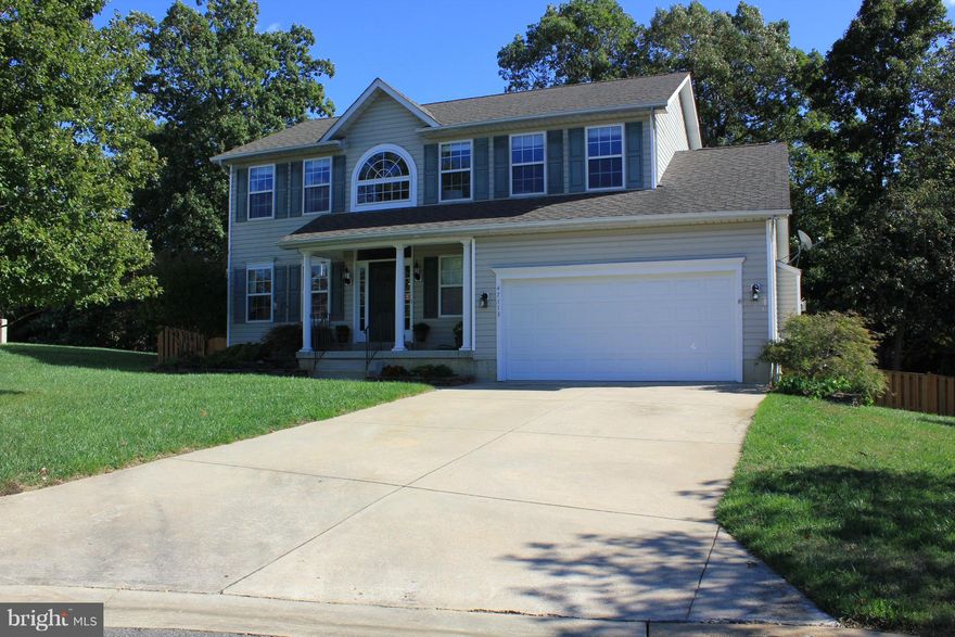 This beautifully maintained home is a pleasure to show - generous sized bedrooms w/walk in closets,  spa  master bath, hardwood floors, open kitchen w/SS appliances and quartz counters , partially finished basement w/ media room and tons of storage!  Deck, fenced in back yard (backs to trees), 2 car garage, located on a cul-de-sac   minutes from everything! Pets case by case.  Good credit.