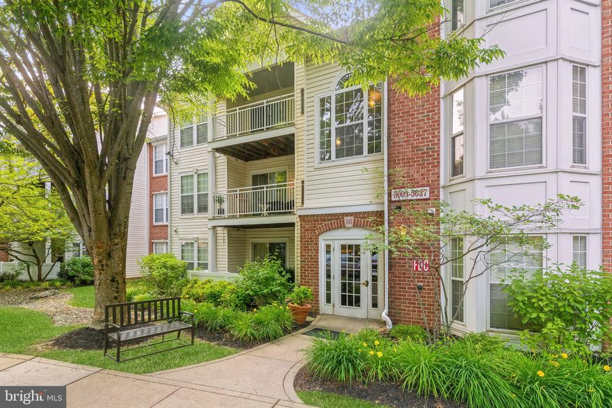 Enjoy the convenience this ground-level two bedroom condo has to offer, tucked away in the popular Silverbrook Wood community, close to everything you need! Graced with accent dentil crown molding that adds a touch of elegance throughout. Sun-filled windows create a bright and inviting atmosphere, and the open-concept living area provides a spacious feel. The dining room seamlessly flows into the kitchen, making it easy to entertain guests. The kitchen is equipped with Corian countertops, a backsplash, a pantry for storage convenience, gas cooking for efficient meal preparation, and pull-out drawers with a pantry for added organization. The primary bedroom suite boasts a walk-in closet, providing ample space for your belongings, and it also has direct access to the bathroom. The second bedroom offers versatility, with doors that open into the living room, allowing you to use the space according to your needs, whether as a bedroom, office, or an additional living area. For relaxation and outdoor enjoyment, you can kick back and unwind on the private covered patio, which provides a cozy outdoor space for leisurely moments. The wonderful community amenities include a BBQ area with picnic tables, dog run, car wash, community center, pool, playground, and a fantastic location close to a variety of shopping, dining and entertainment options.