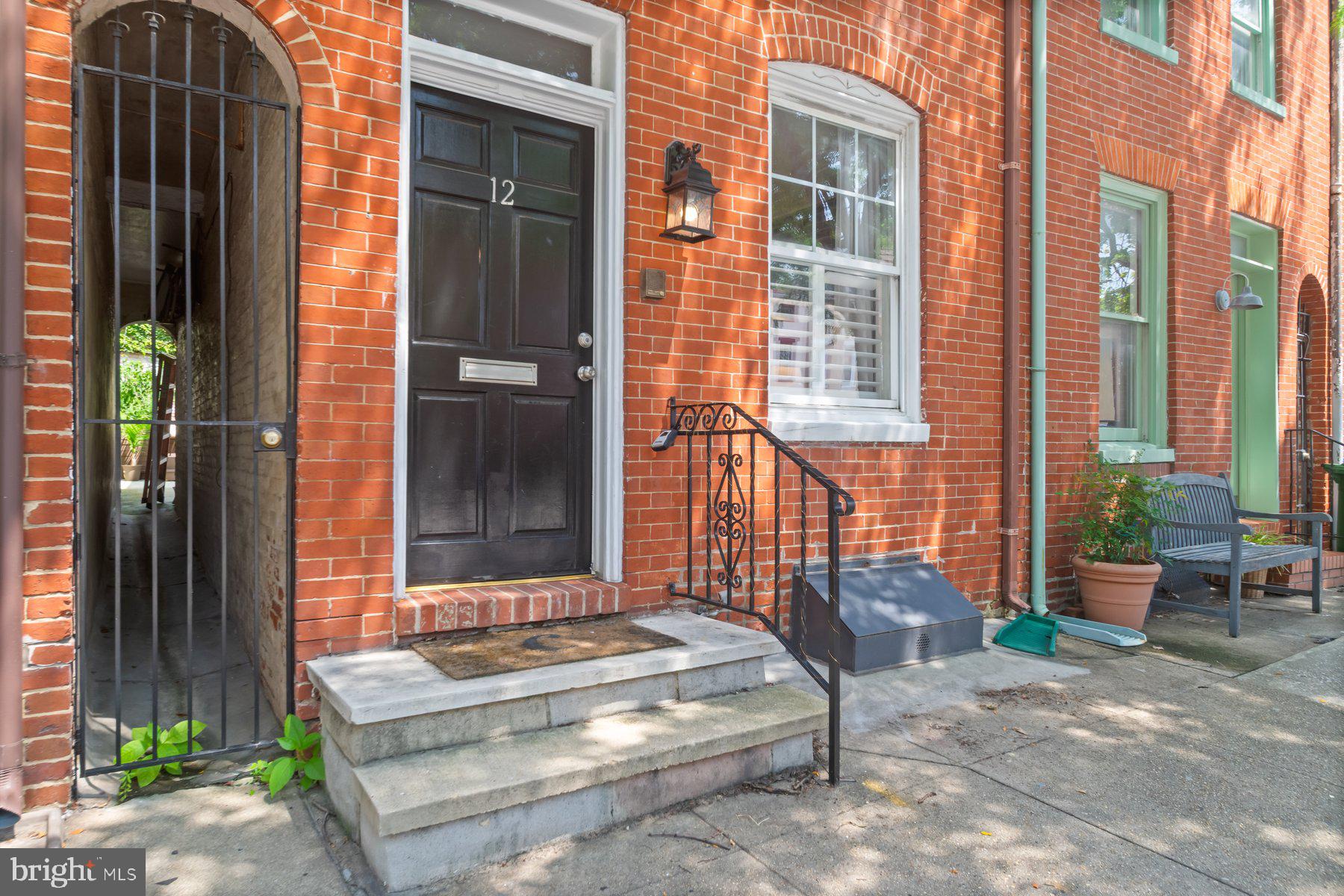 Move-in ready RENTAL Townhome featuring 3BR/2BA with tons of charm and character located on a tree-lined street in Federal Hill. Step inside to a home filled with natural light, original hardwood floors, an exposed brick wall, an exposed wood beam ceiling, original cast iron radiators, and a wood burning fireplace. The main floor offers a large living room, dining room, kitchen with plenty of cabinets, granite countertops, stainless steel appliances, and a garden window above the sink. The second floor features two sizable secondary bedrooms, a full bath, a primary bedroom with a private full bath, and sliding doors to a private rooftop deck. From the kitchen make your way to the fenced yard with an oversized deck surrounded by foliage. This home is move-in ready and in close proximity to shopping, restaurants, and commuter routes.
-15 Day Grace Period, 5% Late Fee
-Renter's Insurance Required
-Tenant Pays All Utilities
-Payments Can be Made Electronically or by Mail