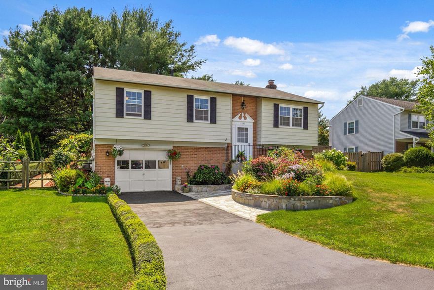 Home Sweet Home! You will fall in love with this beautiful home. The sun filled main level features a spacious living room, separate dining room, updated  kitchen with stainless appliances and granite counters. There is an abundance of storage space for all of your kitchen gadgets and ample counter space for preparing your favorite meals with the vegetables grown in your own garden. There is easy access to the deck and backyard from the sliding door in the kitchen.  Also on the main level you will find the primary bedroom that has a renovated en suite spa-like bath with a  glass shower, 2 additional bedrooms and a full bath. The finished lower level  features the family room with a fireplace and kitchenette, the fourth bedroom and full bath. There's loads of storage space and the laundry room on the lower level and access to the one car garage.  You will relish the opportunity to relax and enjoy the expansive deck that overlooks the spectacular flower and vegetable  garden.  The backyard provides space for relaxation, gardening, entertaining, playing and so much more.   Ideally located, close to shopping, restaurants, parks, close to I-270, ICC-200, Shady Grove Metro station .  Offers due on Tuesday, August 10th at 2:00 pm.  Pre inspections are welcome.