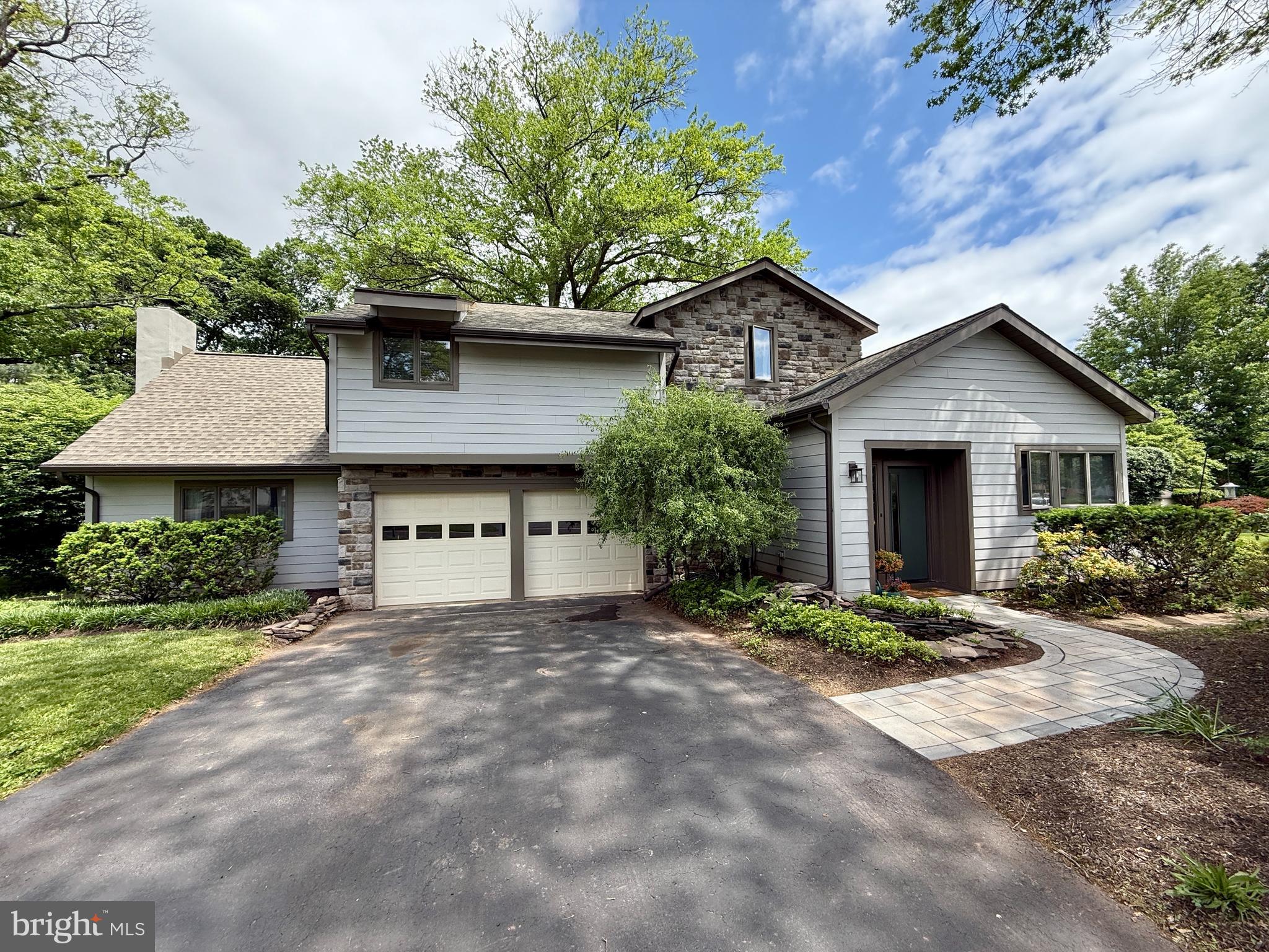Welcome to 3855 Mill Road — a beautifully expanded and updated home nestled on a lush 0.84-acre lot in the heart of Skippack Township. With new Hardie board and stone siding, a new roof, and a brand-new patio, this home is move-in ready and designed for easy living.
Step inside to a bright, sunlit living room with an adjacent reading library — a cozy space perfect for relaxing with a book. Just beyond, you’ll find a spacious kitchen with a large island and eat-in area, ideal for casual mornings or entertaining. Adjacent to the kitchen, a piano room that could easily be used as a formal dining room. The open family room features a cozy fireplace and flows right out to your patio and in-ground pool — perfect for summer gatherings.
On the first floor, you’ll also find a convenient laundry room, a mudroom, a powder room, and a full bath near the back entrance that works perfectly as a pool bath.
Upstairs, the primary suite offers a private retreat with a full bath and double vanity. Three additional bedrooms, a bonus office or craft room, and plenty of natural light complete the second floor. A large unfinished basement provides excellent storage space, and the two-car garage adds even more convenience.
Located in the Perkiomen Valley School District and just minutes from Palmer Park, Evansburg State Park, and the charming shops and restaurants of Skippack Village — this is the one you’ve been waiting for!