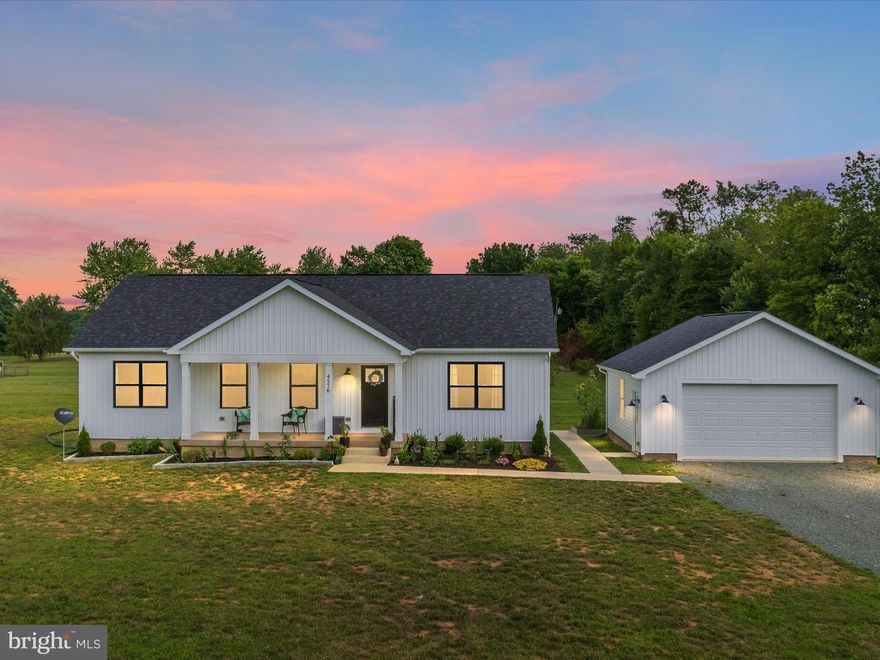 Welcome home to this practically new (built in 2022) turnkey ranch house.  The inviting front porch welcomes one home with great space for rocking chairs. Once inside this gem of a home, you'll find an open floorplan, vaulted ceilings with decorative beams, and lots of natural light!  The kitchen boasts a large granite island and lots of cabinets and ample counter space, plus a large farmhouse sink.  The primary bedroom and bathroom, as well as two other bedrooms and another full bath are all located on the main level! The laundry room is also conveniently located on the main level.  The lower level provides additional living space with a 4th bedroom, bonus/flex room which would make for a great playroom, gym, or home office, a large and open recreation room with a walkup to backyard, a utility room for storage, and a rough-plumb bathroom area to put in another full bathroom if desired.  Best yet, this amazing home sits on 2.96 acres, has no HOA, and already has a fenced in animal pen (partially electric) of approximately .5 acre with an animal shed and chicken coop! Plus the lot includes the following fruit trees: 1 pear, 1 peach. 4 apple, and 2 plum!  This home is an outdoor enthusiast's dream. Located 7 minutes from Messick's Farm market. Only 24 minutes from Broad Run/Manassas VRE station. Welcome home!
