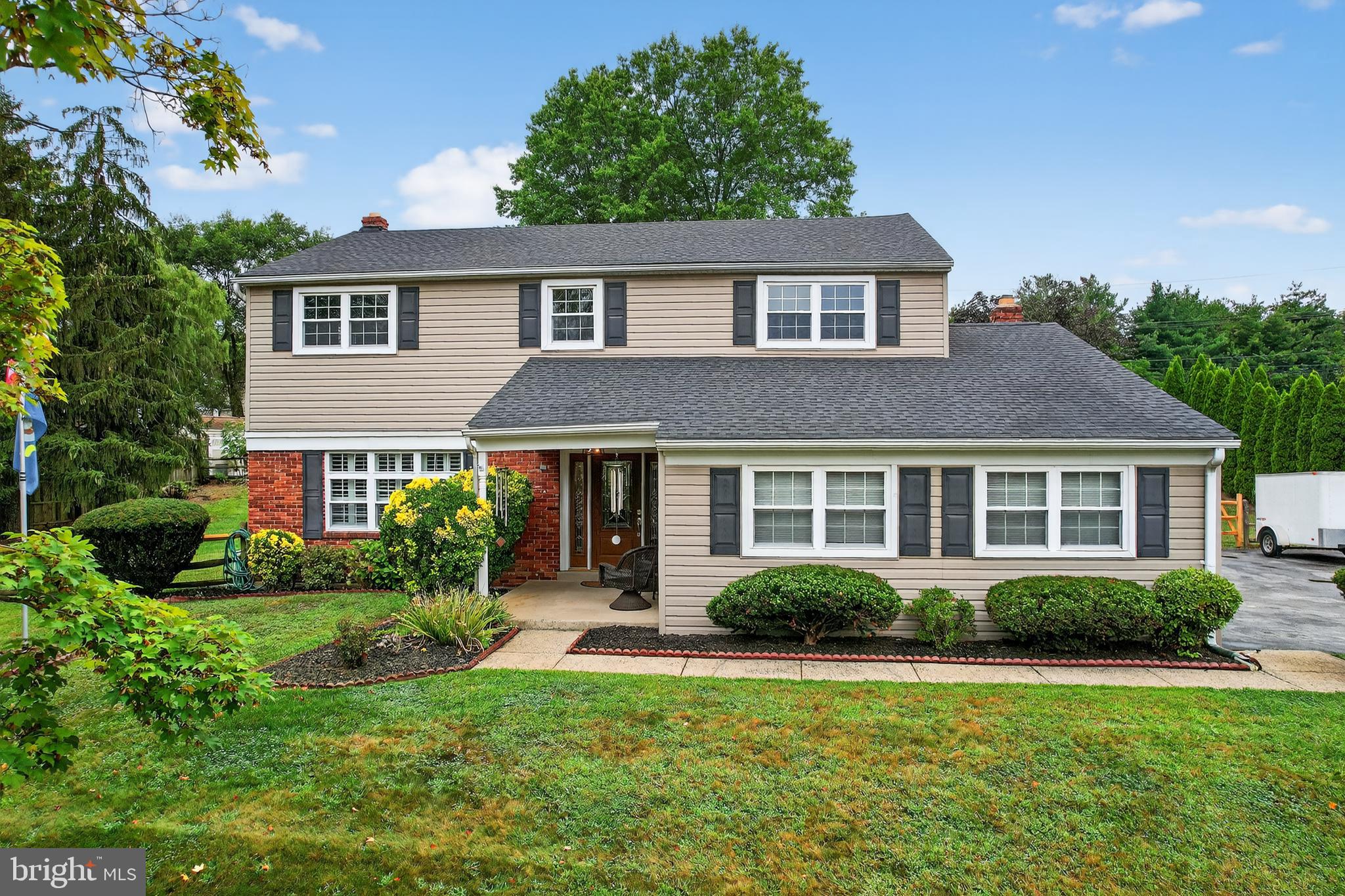 For decades, this 4-bedroom, 2½-bath colonial has been the backdrop to countless memories—holiday dinners in the formal dining room, cozy evenings by the fire in the family room, and sunny mornings in the kitchen overlooking the expansive backyard. From the moment you arrive, pride of ownership shines through. Inside, you'll find original hardwood floors throughout, beautiful plantation shutters in every room, and a thoughtfully designed kitchen with so much storage you will never run out of space. The traditional floor plan is warm and welcoming. Upstairs the serene primary suite features a private updated bath, the main hall bath has also been beautifully updated while three additional bedrooms provide plenty of flexibility. The unfinished basement provides endless possibilities for future living space, storage, or hobby area. Outside, the generous yard invites summer barbecues, gardening, or simply a quiet cup of coffee. This is more than a house - it's a place to call home. Move right in and start making memories of your own!