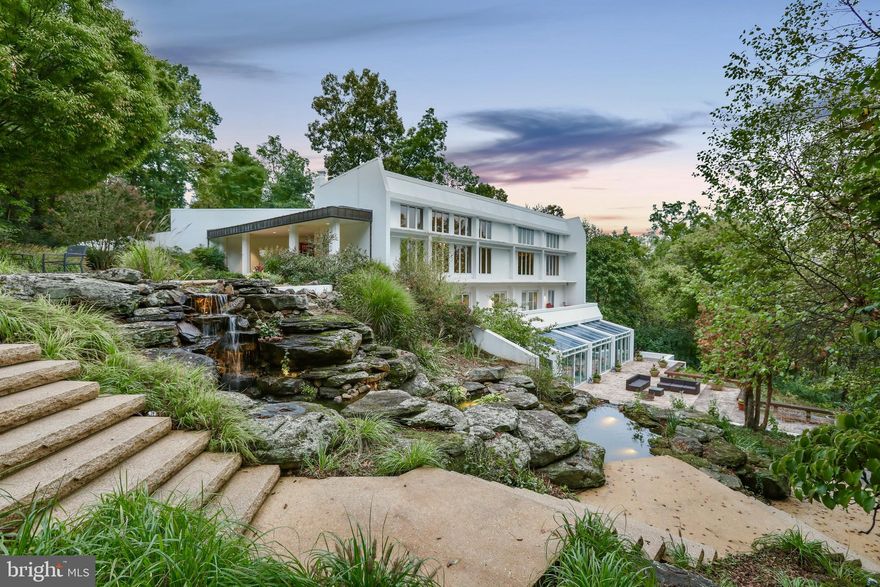 Don't miss your chance to own this remarkable contemporary home in Winchester. This stunning property is in pristine condition and combines modern elegance on a beautiful parcel of land with both open pasture and treed privacy.  With a thoughtfully designed interior and exquisite finishes throughout, this home presents a unique opportunity for discerning buyers seeking both style and functionality.

Upon entering, you are greeted by an abundance of natural light that fills the open concept living spaces. The expansive living room features soaring ceilings, a floor to ceiling wall of windows, and first-class travertine flooring. The adjacent gourmet kitchen is a chef's dream, boasting top-of-the-line appliances, custom cabinetry, and a generous center island that doubles as a breakfast bar. The main level also includes a spacious dining area, ideal for hosting memorable gatherings, as well as a versatile home office or study for those who work remotely.

The primary owner suite is a private sanctuary, complete with a spa-like private bathroom and ample closet space. Four additional well-appointed bedrooms and stylishly designed bathrooms provide comfort and convenience for family and guests.

The indoor pool is rare to find, and in excellent condition - all pumps, lighting, and surfaces have been well maintained.

Outside, the property offers a seamless transition from indoor to outdoor living. The meticulously landscaped yard provides a picturesque backdrop for outdoor activities, while the expansive patio area creates an ideal space for alfresco dining and entertaining. Whether enjoying a morning coffee or hosting a summer barbecue, this outdoor oasis is designed to enhance your lifestyle.

Located in the desirable Winchester community, this home offers easy access to a plethora of amenities, including shopping, dining, and recreational opportunities. With its convenient location and exquisite design, this contemporary gem is an exceptional residence that embodies modern living at its finest.