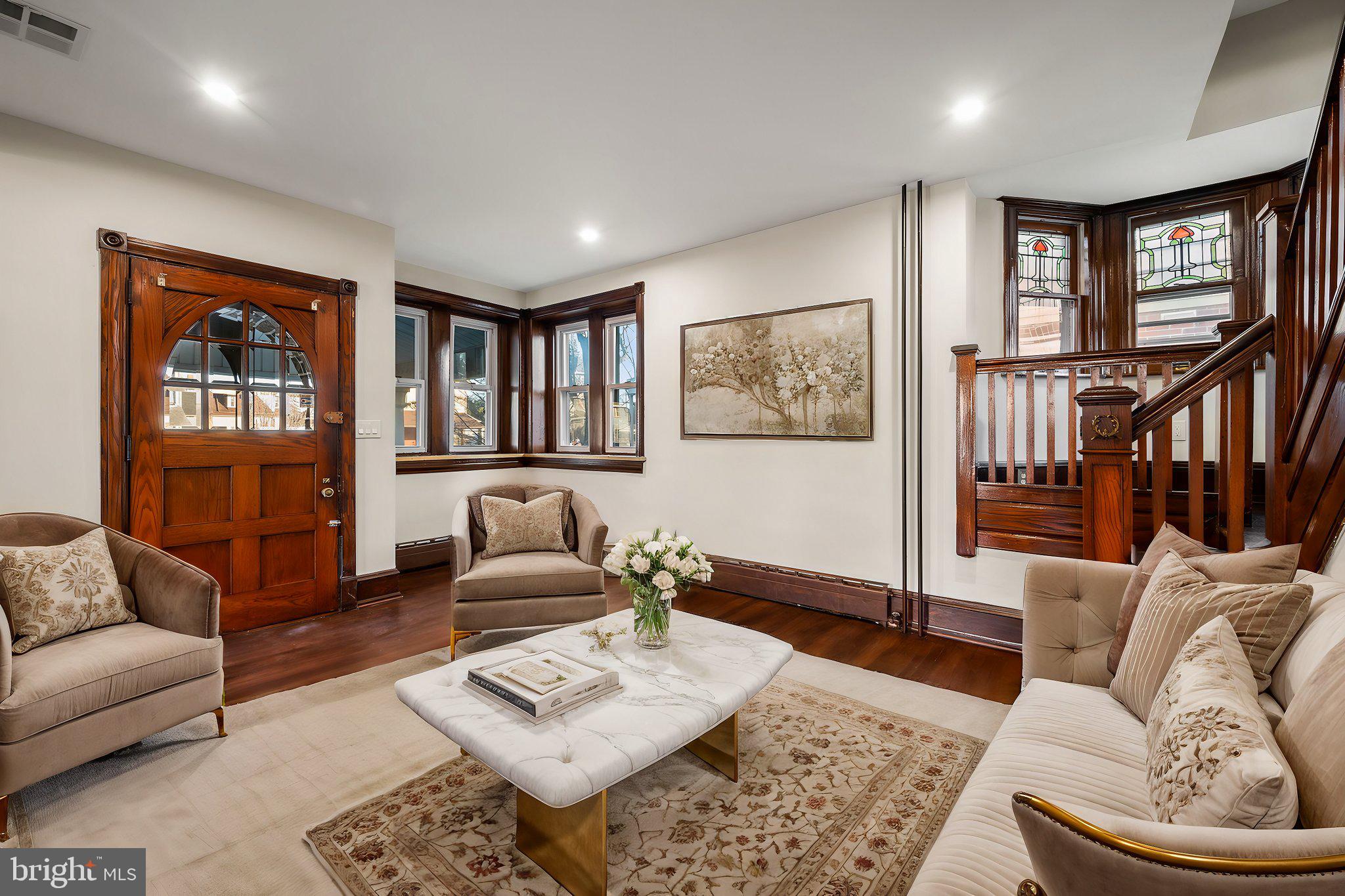 Price drop on this Unicorn! Welcome to this truly unique and charming 4-bedroom, 1.5-bath renovation in the heart of historic Ridley Park Boro. With tremendous character throughout, this home is a true "unicorn" that combines vintage appeal with modern comforts. From the large, inviting front porch complete with a swing to the stunning oval arch stone front door, the home exudes warmth and charm. Inside, you'll find beautifully refinished original hardwood floors, gorgeous stained-glass windows, and a staircase with exquisite original woodwork.
The spacious living room features a cozy fireplace, and all windows have large sills, adding to the home’s character. The custom modern kitchen boasts ceramic tile floors, sleek white shaker cabinets, Brushed Gold Hardware, quartz countertops, and a convenient original pantry, along with a first-floor laundry area for ease and convenience.
Upstairs, the second floor features a luxurious 4-piece bath with a stunning green tile shower, brushed gold fixtures, a soaking tub, and vintage-inspired flooring, creating a spa-like retreat. The third-floor attic is fully finished, offering endless possibilities as an extra bedroom, playroom, or versatile space to suit your needs.
This home also includes brand-new central air for year-round comfort. The large backyard is perfect for outdoor entertaining and includes an oversized 2-car garage. Just down the street from the ballpark and a 2-minute walk to local stores, restaurants, and the train to Philadelphia, this home offers both tranquility and convenience in an ideal location. Don’t miss the chance to own this one-of-a-kind gem!