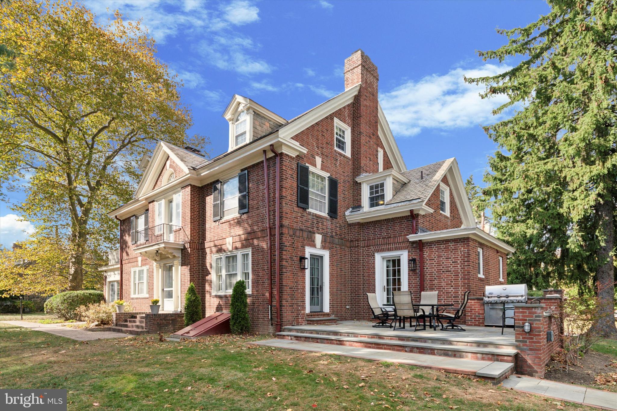 Welcome to this updated, full brick and slate roof Center Hall Colonial in desirable, walkable Bala Cynwyd, Gracious, well-proportioned rooms, a floorplan ideal for entertaining, meticulously cared for and visually stunning, this home is a complete package. 5-bedrooms and 4.5-bathrooms of style and grace offer a timeless elegance combined with modern amenities. As you step through the front door into a welcoming foyer, you'll be greeted by gleaming hardwood floors that flow seamlessly throughout the first floor. A large and spacious living room is bathed in natural light and features a beautiful fireplace with elegant mantle as the focal point. Adjacent find a sunroom with beamed ceilings, walls of windows and French doors to the backyard. This sunroom, unlike many, is extra wide, offering plenty of space for an office, TV room or library. On the opposite side of the foyer find a generously sized dining room with built in corner cabinet, and separated from the kitchen by an impressive series of custom french pocket doors, offering multiple options from the most casual to formal dinner party gatherings. The kitchen was rebuilt from the studs by the current owner, and includes an abundance of counter and cabinet space. It features double wall ovens, a panel refrigerator, custom ventilation hood, a convenient pot filler above a Wolf 6 burner cooktop, and a large central island with additional seating. A stylish tile backsplash adds a touch of sophistication, and completes a design aesthetic that ensures the kitchen truly is the heart of the home. Off the side of the kitchen, near the door to the patio, find a powder room and mudroom with built ins, perfect utility. Upstairs on the second level, a luxurious primary suite awaits, complete with hardwood floors and a serene sitting area. The suite features a generous walk-in closet and an en-suite bathroom with a double vanity and a large walk-in shower, all redone by the current owner. The primary suite also includes direct access to a private deck, ideal for unwinding with a book or enjoying your morning coffee. Two additional well-appointed bedrooms and a full bathroom are located on this level. The third floor offers three more spacious bedrooms (one currently used for storage), another full bathroom and laundry room. Downstairs, a finished basement including an additional full bathroom, half kitchen and direct exterior access provides a fantastic bonus space, perfect for a home gym, recreation room, additional living area and more. Outside, enjoy a peaceful blue slate back patio, ideal for outdoor dining and relaxation, overlooking a flat backyard lawn, landscaping and more. A two-car detached garage fits perfectly with the setting and mirrors the brick and slate roof finish of the main house. Conveniently located in the heart of Bala Cynwyd, Lower Merion Township, this home is a short walk to award winning Cynwyd Elementary and Bala Middle Schools. Also within walking distance to the Cynwyd SEPTA train station, the Cynwyd Recreation Trail, houses of worship, shopping and more. All this, and still within 15 minutes of Center City Philadelphia. Don’t miss this elegant Bala Cynwyd home…schedule a showing today!
