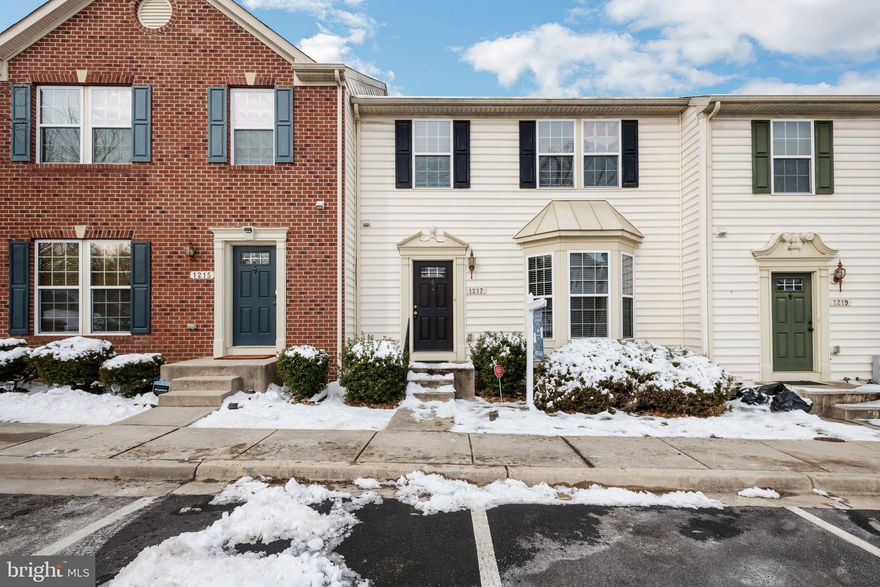 Welcome home to this 3 bedroom, 2.5 bathroom townhouse in Odenton! Never have to worry about parking with two assigned spaces. As you enter the home you will find beautiful hardwood floors reflecting the abundant natural light streaming in from the large bay window. Make your way to the dining room and the adjacent fully-equipped kitchen. This kitchen features a large prep island, granite countertops, stainless steel appliances and ample cabinetry for all of your food storage and prep needs! The sliding glass doors lead out to the spacious deck - the perfect place to enjoy outdoor dining and entertaining in the warmer months! On the upper level of the home you will find the primary bedroom with a large walk-in closet and private en-suite bathroom featuring a dual sink vanity. Two additional bedrooms with their own closet storage and a shared hall bathroom complete this level. The fully-finished lower level provides the perfect space for a family room or rec room as well as laundry facilities. Neighborhood amenities include a small park/playground and picnic area. Enjoy easy access to numerous shopping and dining options. Don’t hesitate to make this your own, today!