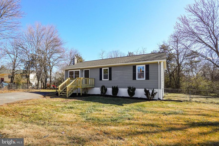 Amazing Renovation! Gourmet Eat-in Kitchen – QUARTZ Counters, New SS Appliances, New Custom Cabinets and Hardware. Open Floorplan! New LVP, Carpet, Hardware, Lighting and Paint Throughout! Newer Roof – Approximately 5 YO with New Gutters. Newly Renovated Bathrooms include New Vanities, New Toilets & Shower Surround and Fixtures. Privately Fenced Rear Yard w/New Deck and New Glass Slider Door. New Vapor Barrier in Crawl Space. New Front Porch, New Ceiling Fans, New Water Heater and Most Windows are New. Washer and Dryer Convey As-Is. Nearby Major Commuter Routes.