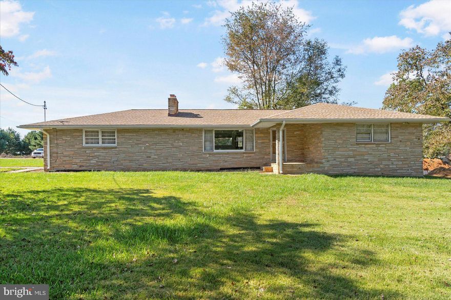 This beautiful custom-built rancher sits on a spacious .54 +/- acre lot just minutes from everything Bel Air has to offer.  Enjoy one-level living in this 3 bedroom 2 full bath home with an oversized two car side load garage.  Enjoy your morning coffee or an evening cocktail on the covered front porch.  Take a peak under the wall-to-wall carpet in the three spacious bedrooms and you'll find the original hardwood floors.  The 1200 sq ft basement is awaiting your finishing touches.  The home has a 3-year-old roof, a brand new oil tank, and has been recently connected to public water and sewer.