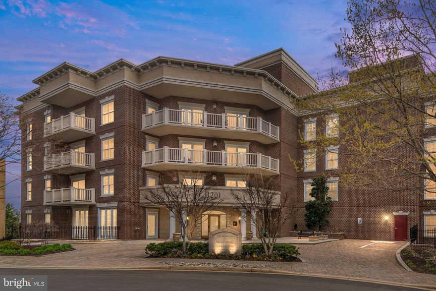 Discover boutique luxury at its finest in the prestigious Memorial Overlook Condominiums. This meticulously crafted residence spans 2068 sq. ft., boasting 2 bedrooms, a den, and 2 full baths, exuding sophistication, and charm at every turn. Situated at the end of Nash Street, this exclusive abode offers unparalleled privacy and serenity, surrounded by lush, mature greenery.

Unique to Memorial Overlook the main entry on Nash Street is on the 3rd floor. #102 is located two full floors above ground on Ft. Meyer Drive. 
 
Upon entering, you're greeted by a foyer adorned with marble detailing, setting the tone for the grandeur that awaits. The gourmet kitchen beckons with expansive counters, chef grade appliances, custom cabinets, a wall oven, wine fridge, and additional prep space, catering to the most discerning chefs. A convenient laundry room and space for a breakfast table complete this culinary haven.
 
The expansive living and dining area, seamlessly transitions to hardwood floors throughout, features a cozy gas fireplace and a bay window offering lovely views of the wooded tree line. Step outside onto the balcony, providing ample space for outdoor entertaining and relaxation, perfect for enjoying the serene surroundings.
 
The primary bedroom suite, secluded on one side of the condominium, boasts two generous walk-in closets with custom built-in cabinetry. The luxurious ensuite primary bath features double sinks, a separate vanity for makeup, a soaking bath, and a spa-like walk-in shower, offering a blissful retreat after a long day. On the opposite side, you'll find the den, second bedroom, and another full bath, providing ample space and privacy for guests or a home office.
 
This remarkable residence includes two assigned garage parking spaces and two storage units for added convenience. Residents enjoy access to on-site management, a dedicated concierge, a state-of-the-art gym, and inviting lounge areas. The condo fee covers most utilities, including gas and hot water, ensuring effortless living.
 
Conveniently located near iconic landmarks such as the Iwo Jima Memorial and Arlington National Cemetery, as well as vibrant neighborhoods like Georgetown and Downtown DC, Memorial Overlook offers easy access to Rosslyn Metro and DCA, making city living a breeze.
 
Experience the epitome of luxury living at Memorial Overlook Condominiums—a haven of tranquility amidst the bustling cityscape.