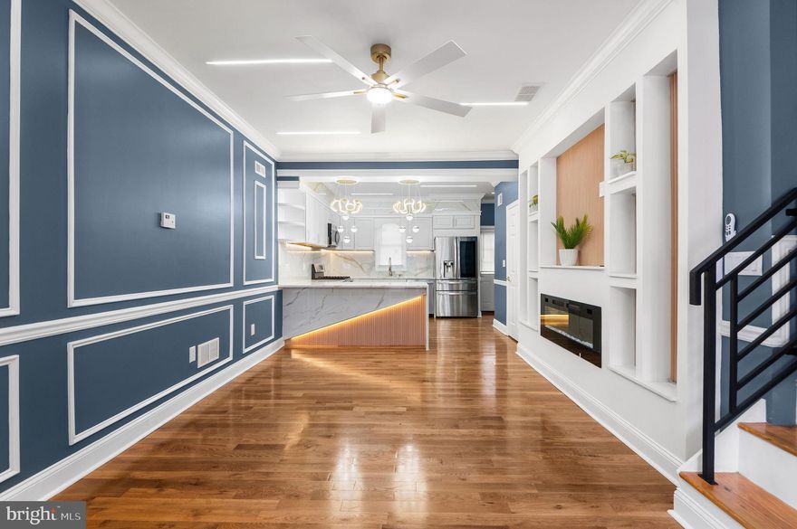 Welcome to 1942 S 56th Street. This is a beautifully renovated 4 bedroom 2.5 bath. Upon entering, you will walk into an inviting open floor living area with hard wood floors throughout and an electric fireplace along with a powder room for guests. Head into your new kitchen with all brand new stainless steel appliances and a beautiful island great for entertaining. Upstairs you will find 3 nice sized bedrooms and a full bath. In the basement, enjoy another living space with an electric fireplace, full bath, laundry and your fourth bedroom. Great to use as a in law suite or even a man cave. There is also a walk out to the private backyard from the basement. This house has brand new central cooling and heating. Close to public transportation and easy access to Center City! Schedule a showing today!