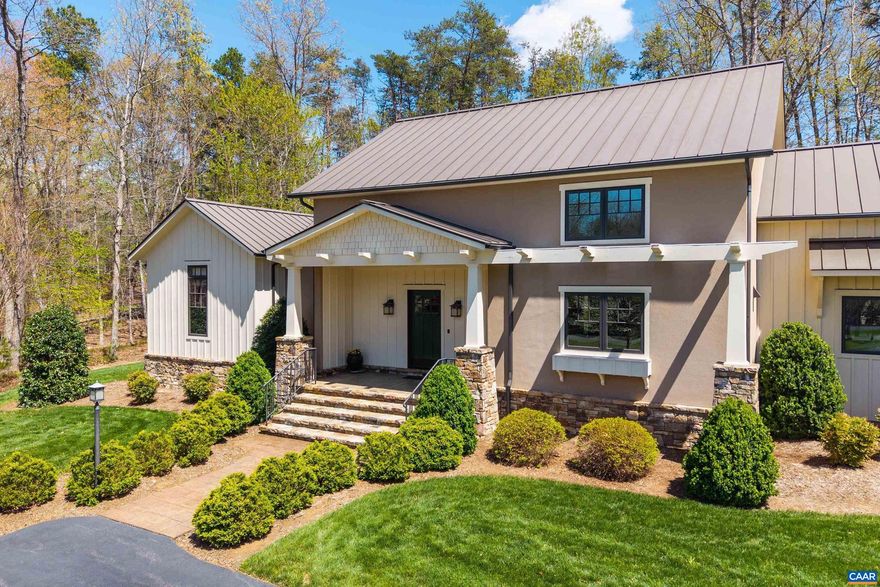 This custom-built Arts & Crafts located in Keswick Estate, is a combination of timeless design, superior craftsmanship and privacy.  Inside, rich natural materials define the home?s character, including hand-scraped oak floors, slate tile, and fir beams & trim. A Virginia fieldstone fireplace anchors the Great Room, flanked by custom built-ins that conceal media and provide space for display. The main-level primary wing is a private sanctuary, featuring a dedicated office, spa-inspired bathroom with soaking tub, tiled shower, heated floors, and a custom walk-in wardrobe. Two additional bedrooms and a full bath over the 3-car garage provide adaptable spaces for guests, work, or retreat. Modern systems include a walk-in wine cellar, zoned HVAC, tankless water heater, whole-house generator, integrated sound system, encapsulated crawl space, drip irrigation and 50-year standing seam metal roof. Set within one of Central Virginia?s most desirable gated communities, this is refined country living.,Glass Front Cabinets,Granite Counter,Oak Cabinets,Fireplace in Living Room