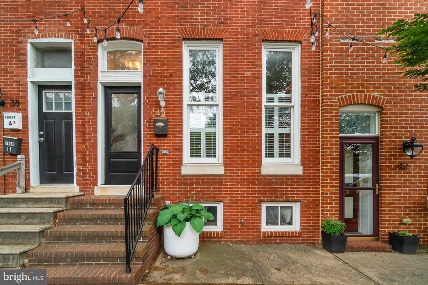 Come and explore this very spacious home that combines classic Baltimore charm with thoughtful modern updates, including recessed lighting,  hardwood floors, high ceilings, and exposed brick. Entertain easily in this open floor plan with a first floor half bath and a beautifully updated eat-in kitchen with tons of counter space and storage, plus a new dishwasher.  Upstairs are two bright bedrooms (one with a deck), generous closet space and two full bathrooms. Also upstairs are brand new washer and dryer so you’ll never have to carry that laundry up and down the stairs again. Other tasty updates include HVAC/Central AC replaced in 2020 and a new water heater. 

Located in the highly sought-after Butchers Hill neighborhood, right by Patterson Park, you’ll have easy access to Canton, Fells Point and Harbor East as well as to the Johns Hopkins Hospital and medical campus.  It’s just a short walk to the park’s historic pagoda and one of the city’s best green spaces, featuring walking/running paths, festivals, flea markets, and year-round community events.  While the neighborhood is super walkable you might still choose to drive somewhere. One of the biggest city perks? A private 2-car parking pad, so you’ll never have to drive around looking for a space. Your Baltimore life can be a perfect blend of walkable city living, green space, and waterfront access.