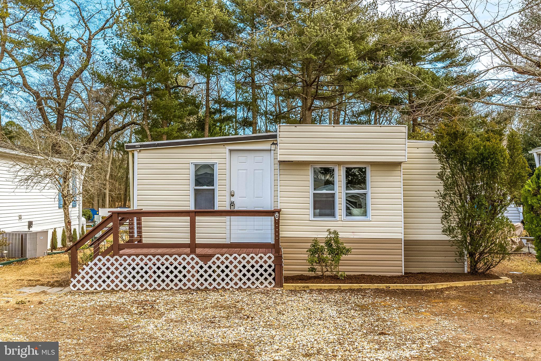 Discover your ideal home on the Eastern Shore, just minutes from Ocean City, MD! This fully renovated gem in the gated community of White Horse Park I offers modern living with 2 bedrooms, 2 bathrooms, and a versatile bonus room for extra sleeping space or an office. The heart of the home features a stunning new kitchen with quartz countertops, white shaker cabinets, and stainless-steel appliances. Both bathrooms have been beautifully updated with custom tile work and contemporary fixtures. Enjoy luxury and comfort with new flooring throughout and ample storage with an included shed.
For just $165/month, the HOA fee covers water, sewer, trash, security, and access to top-notch amenities. Enjoy the clubhouse, outdoor pavilion, boat ramp, basketball court, playground, kayak racks, picnic areas, and bath houses. Boat slips are available at the marina for $550 per season, and boat storage is just $50 per year.
White Horse Park is open year-round, offering a great opportunity for short-term rentals or enjoying the best of Worcester County. You're close to the Ocean City Boardwalk, Assateague Island, Berlin's shops, and more. Don't miss out on this rare find, offering both serenity and excitement on Maryland's Eastern Shore!
