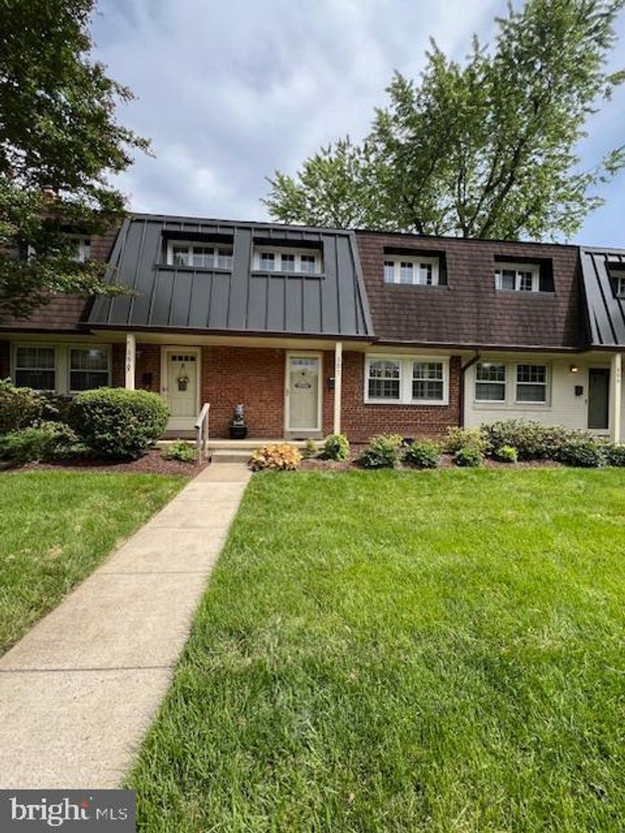 Beautifully updated 3-bedroom, 1.5-bath Winter Hall Condo in prime Falls Church City location. Bright living/dining area with red oak hardwood floors, plantation shutters, and renovated powder room. Renovated kitchen with granite counters, ample storage cabinets and backyard views. Stackable washer/dryer and coat cubby off the kitchen. Fully fenced backyard with slate patio and rear gate leading to an assigned parking (#41), plus abundant street parking. Red oak Hardwood floors throughout the main and upper levels, including stairs. Upstairs features three bedrooms, a renovated full bath, and a linen closet. Unbeatable location with a 93 Walk Score—steps from Falls Church Farmers Market, top restaurants, cafes, Whole Foods, Harris Teeter, parks, shops, and bus stops. Convenient access to major commuter routes and East Falls Church Metro. NO PETS.  AVAILABLE AUGUST 7th.