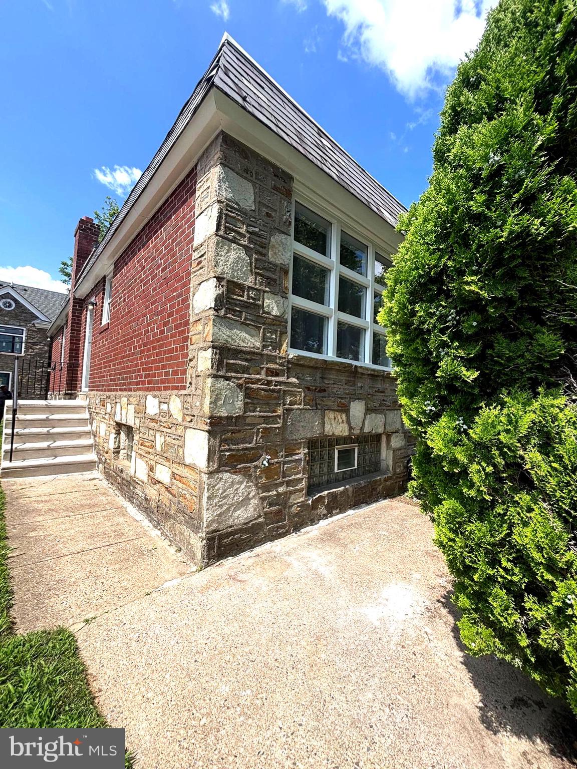 Welcome to your dream home at 7104 Stenton Ave, a beautifully remodeled stone front twin rancher nestled in the desirable and vibrant East Mt Airy. This stunning and meticulously contemporized residence boasts 3 bedrooms and 3 bathrooms. It has blended modern upgrades such as granite countertops, farm-style kitchen sink, stainless steel appliances, spa style shower systems and most importantly comfort. The main floor hosts two spacious bedrooms with one being an ensuite while the lower level houses the impressive master suite. Schedule your tour today because this show stopper won't last long! Your new home is awaiting YOU!