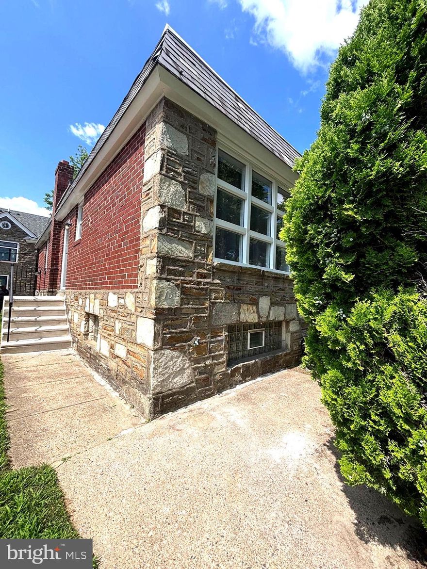 Welcome to your dream home at 7104 Stenton Ave, a beautifully remodeled stone front twin rancher nestled in the desirable and vibrant East Mt Airy. This stunning and meticulously contemporized residence boasts 3 bedrooms and 3 bathrooms. It has blended modern upgrades such as granite countertops, farm-style kitchen sink, stainless steel appliances, spa style shower systems and most importantly comfort. And for functionality, NEW energy efficient HVAC system, water heater and windows throughout! The main floor hosts two spacious bedrooms with one being an ensuite while the lower level houses the impressive master suite. Schedule your tour today because this show stopper won't last long! Your new home is awaiting YOU!