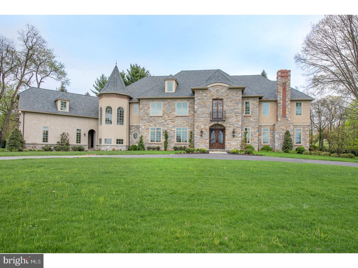 BUILDER SAYS SELL!!!! Unbelievable New Price over 1 MILLION DOLLARS UNDER ORIGINAL APPRAISED VALUE!!! Why wait to build when you can move in immediately to this Impressive European Manor Estate Home creatively designed and custom built by George P Semerjian (GPS Custom Builders LLC) using only the highest level of quality materials and unparalleled craftsmanship. Situated on a beautiful two acres plus lot overlooking Ardrossan Farms on a quiet sought after street in Villanova, this sensational home offers approximately 13,000 square feet of exceptional finished living space on four levels bursting with luxury appointments and one-of-a-kind details. Features include seven bedrooms, nine full bathrooms, three powder rooms and private guest quarters or au paire suite on the third floor; gracious living room with piano alcove and custom limestone composite fireplace, formal dining room, custom mahogany study with extraordinary millwork, built in bookcases, and marble fireplace; gourmet kitchen with breakfast/morning room, and exquisite family room with impressive cathedral ceiling with solid wood timber trusses and floor to ceiling stone fireplace and Fabulous Bar area. The unbelievable lower level features state-of-the-art home theatre, full size bar, space for a wine cellar, exercise room, recreational area and additional fireside family gathering room. This magnificent home boasts exquisite attention to detail, custom millwork, intricate mouldings and ceiling medallions, limestone flooring in entrance hall, Herringbone Random width oak and Herringbone hardwood flooring, elegant archways, custom hammered wrought iron railing with mahogany handrail, four wood burning fireplaces with gas logs, custom built cabinetry by Halkett, top-of?the-line appliances, prewired speakers throughout house, flagstone patios,professional landscaping, and so much more! Room for a pool or additional Garages! This convenient location is within walking distance to the Willows, Downtown Wayne and Ardrossan Farms, close to the Radnor Township Walking and Bike Trail, and within close proximity to the trains, all major highways for commuting to center city and the airport and the towns of Wayne, Newtown Square, Villanova, Bryn Mawr and King of Prussia for shopping and dining.
