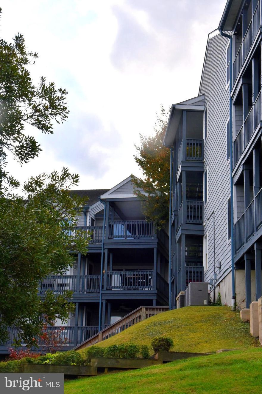 Welcome to Rigbie Bluff where coastal charm meets modern comfort. This two-bedroom, two-bath end-unit condominium is situated  on the second floor - perfectly positioned to capture southern sunlight and breathtaking views of the Chesapeake Bay and Sassafras River.  Delight in views of sailboats, yachts and ships crossing the Bay from the floor to ceiling sliding windows  that line the living room and primary bedroom entrances to  the spacious waterfront balcony that spans the entire rear wall of the unit.

Inside you'll find a bright, open-concept living space featuring an updated kitchen,  brand-new contemporary furnishings — most of which convey with the unit,  a compact laundry and a primary bedroom suite with walk-in closet and attached bath.  Every detail is designed for comfort and casual living; from the easy care engineered hardwood floors to  the smart thermostat you can control  from your phone, to the HVAC system and water heater which were both replaced within the last  three years.

Outside, enjoy your morning coffee on the balcony overlooking the Bay or take a short stroll to the community saltwater pool and private pier. The unit includes a deeded boat slip on the community pier and comes with a boat lift for easy access to open waters. On the lower level, you’ll  find a spacious private storage area with its own separate entrance — ideal for bikes, kayaks and boating gear or use as a workshop area.  Parking is effortless, with one reserved space directly in front of the unit and ample guest parking just steps away. 

This home is a short walk to Betterton Beach and one of the area’s finest waterfront gourmet restaurants.  It's also close to Betterton's public tennis courts and playground.    Together, condominium  amenities  and recreational facilities in the surrounding area offer something for everyone.     Explore and enjoy  local historic towns, nature parks and  countless rivers, creeks, and coves the Eastern Shore waterfront has to offer — all from your own slice of paradise at Rigbie Bluff.    Whether you are looking for a vacation getaway or a year-round residence, this lovely, move-in ready home delivers the best in year-round living comfort, convenience and coastal charm.