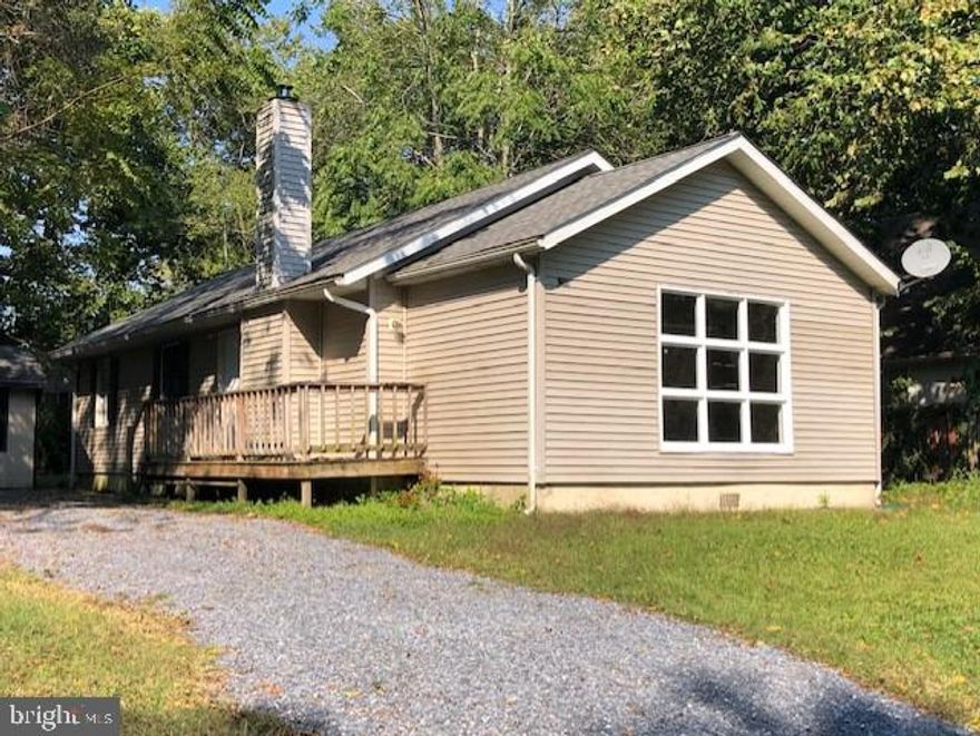 Cute single family home on what is often referred to as the best street in Greensboro! Who would think you could get water views at this price?! Really nice sized kitchen, 2 full baths which were redone just a few years ago. HVAC and roof new within the last two years! Washer/Dryer and water heater all very recent as well. Public boat ramp just around the corner and the driveway was just re-stoned and has room to park your smaller boat and trailer! Enjoy the fire pit in the back yard after spending the day on the water or warm up by the cozy fireplace in the living room and catch a movie. Great opportunity at an affordable price!